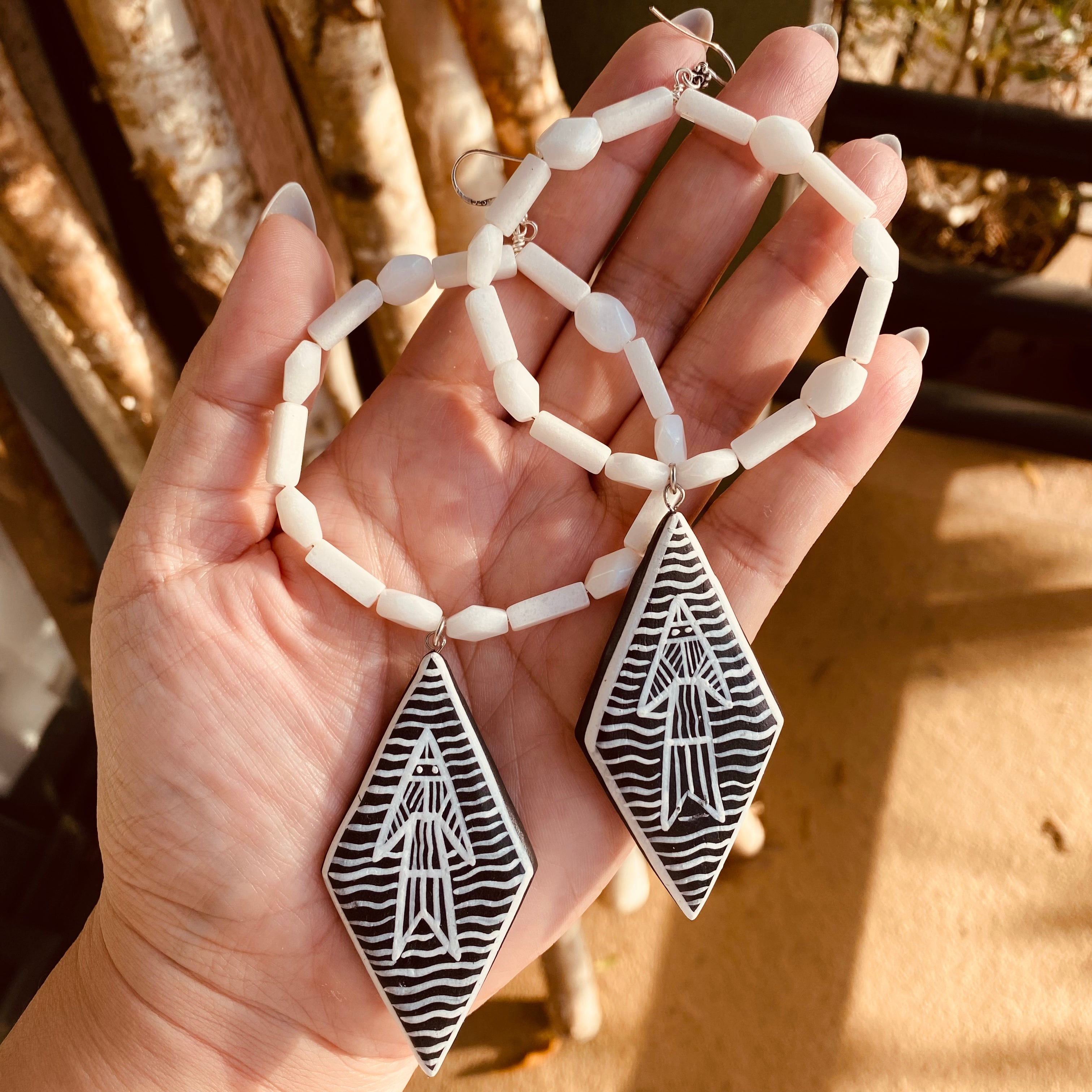White jade abstract fish earrings by Jenny Dayco 6