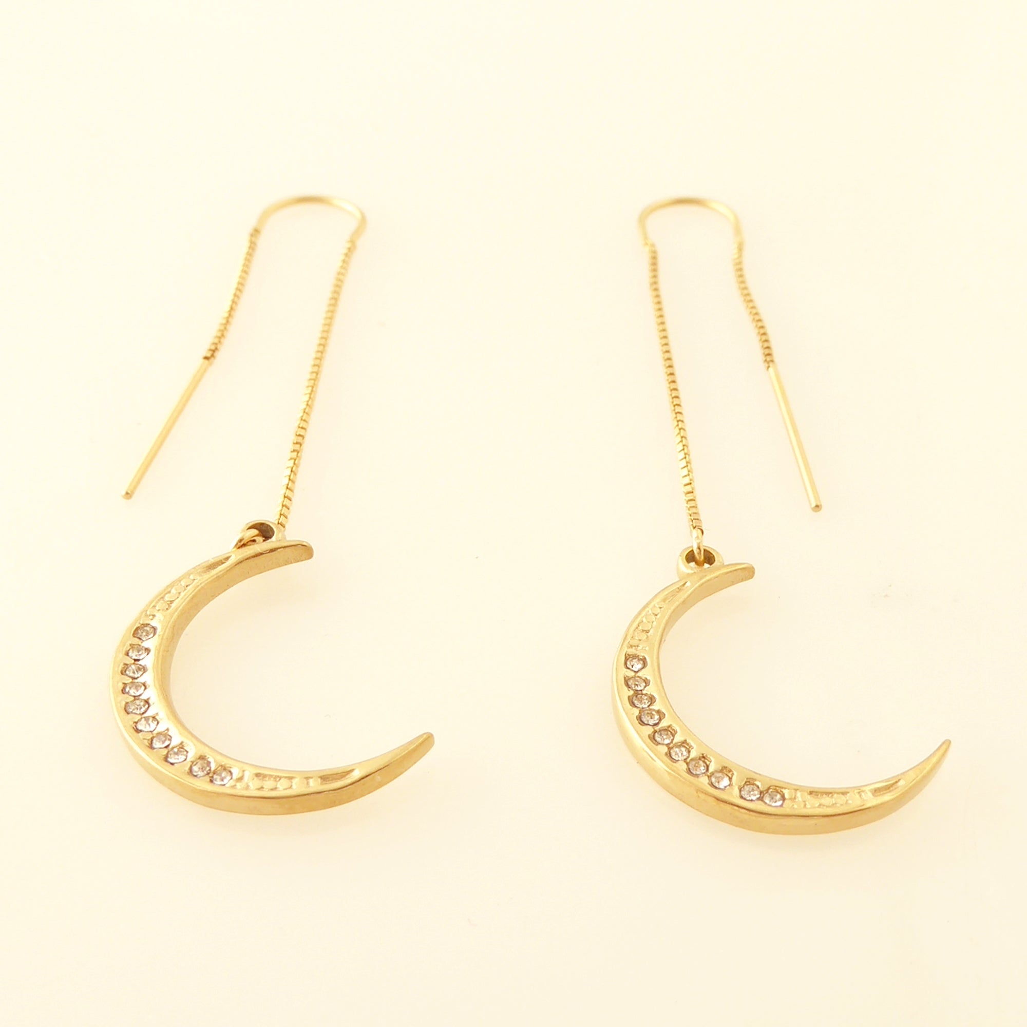 Gold crescent moon threader earrings by Jenny Dayco 3