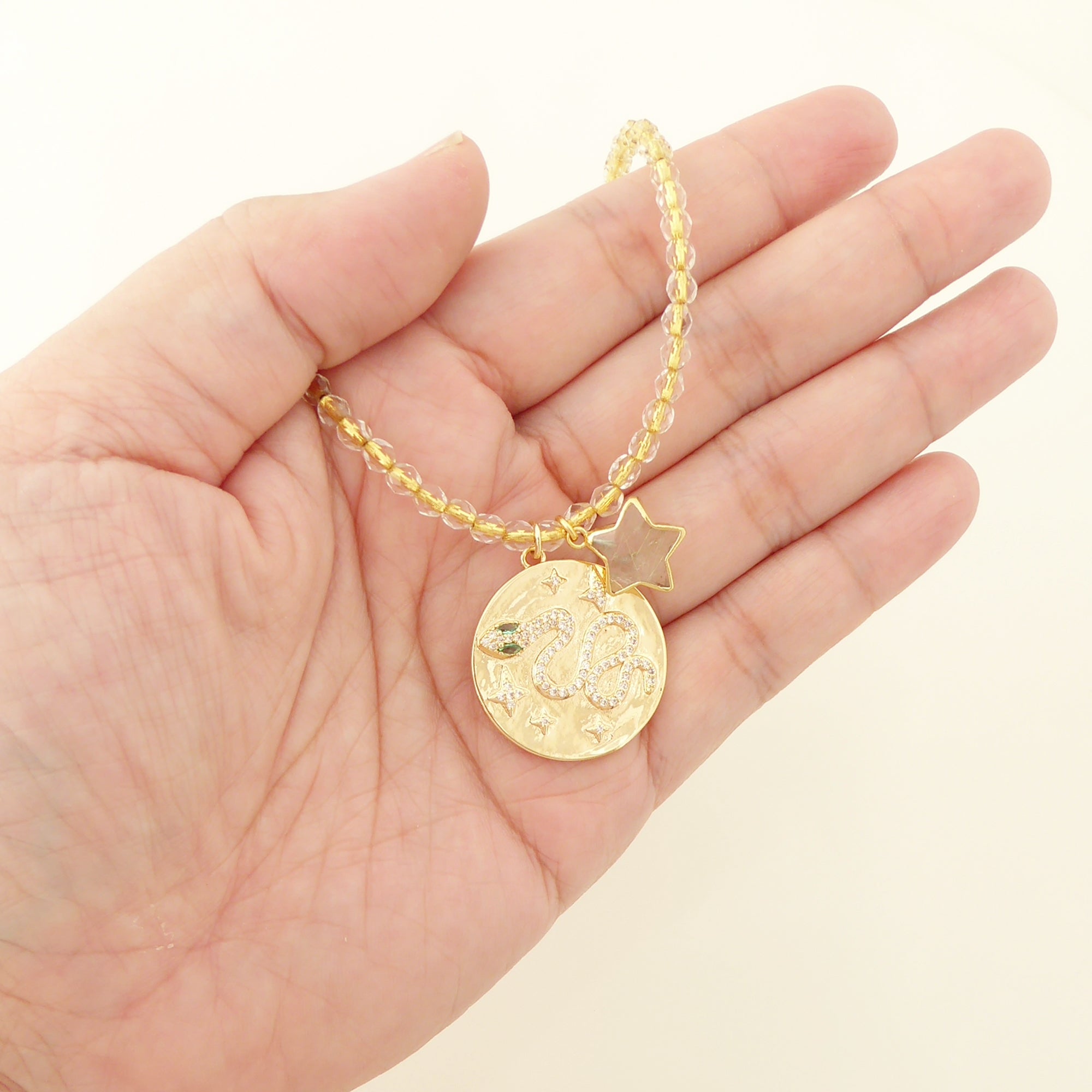Gold snake medallion necklace by Jenny Dayco 5
