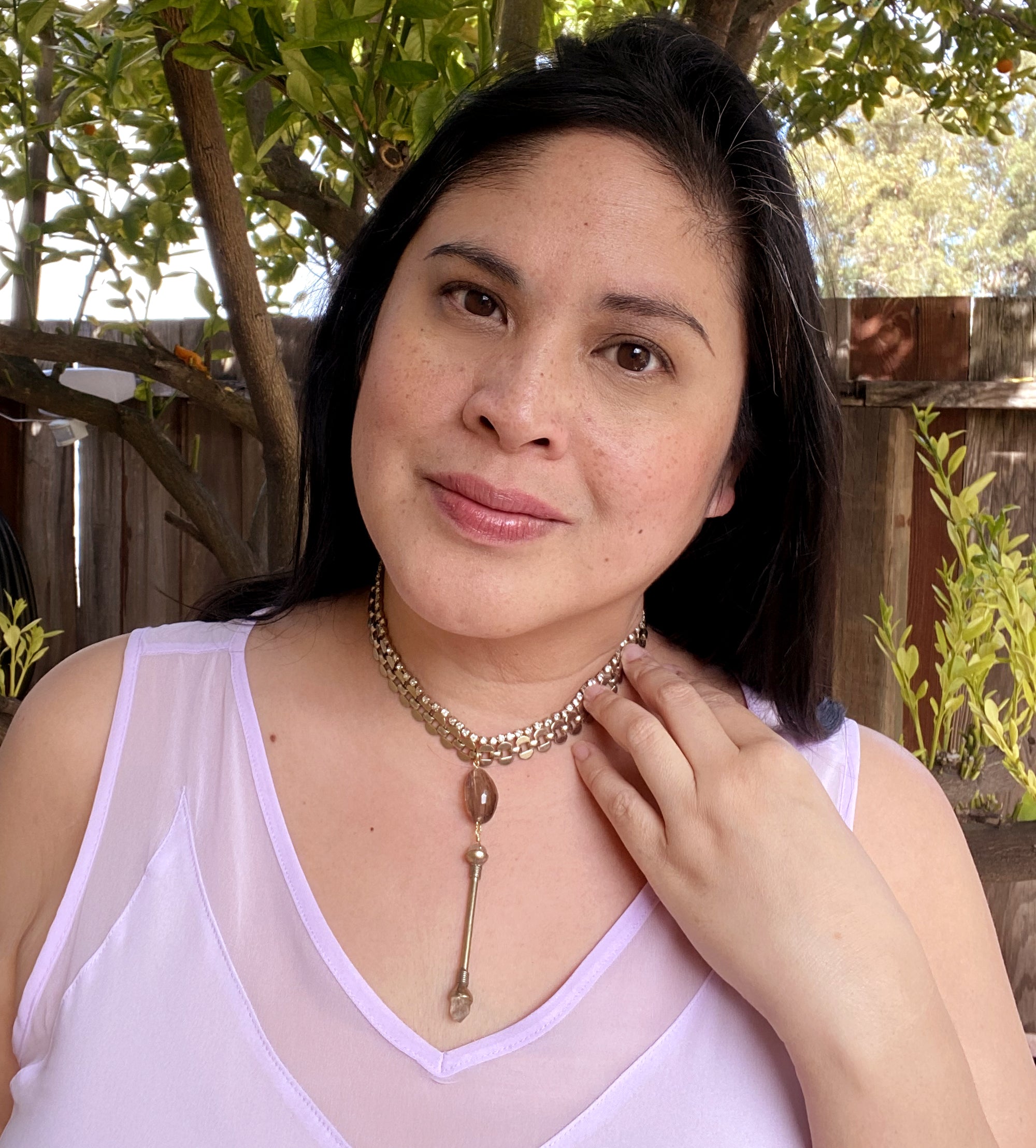 Jenny Dayco wearing crystal wand choker necklace