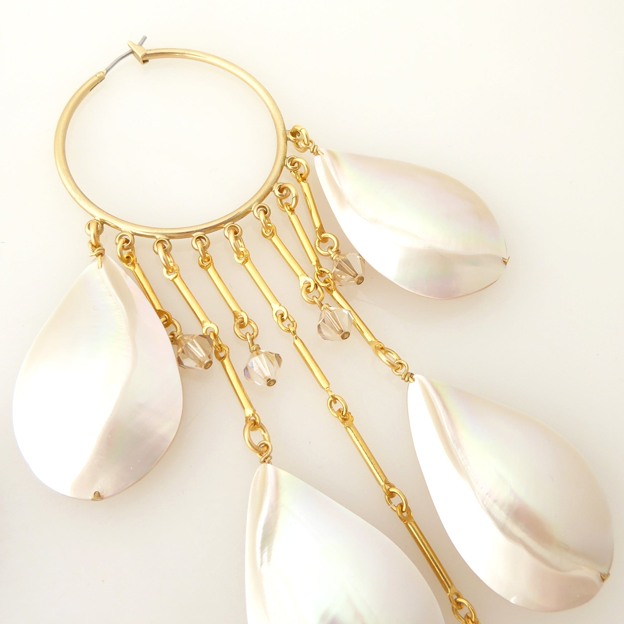 Raindrop shell hoop earrings by Jenny Dayco 5