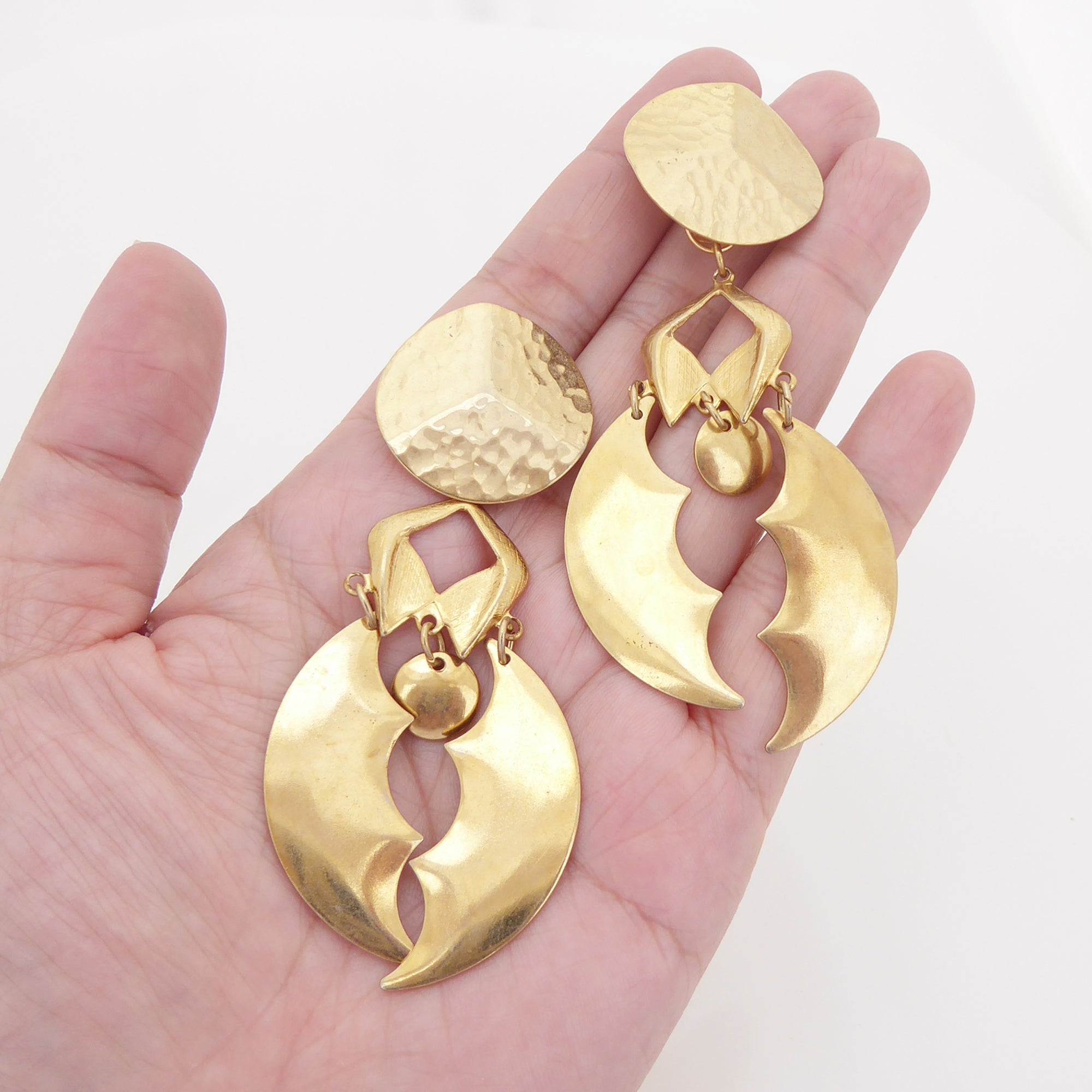 Gold batwing earrings by Jenny Dayco 4