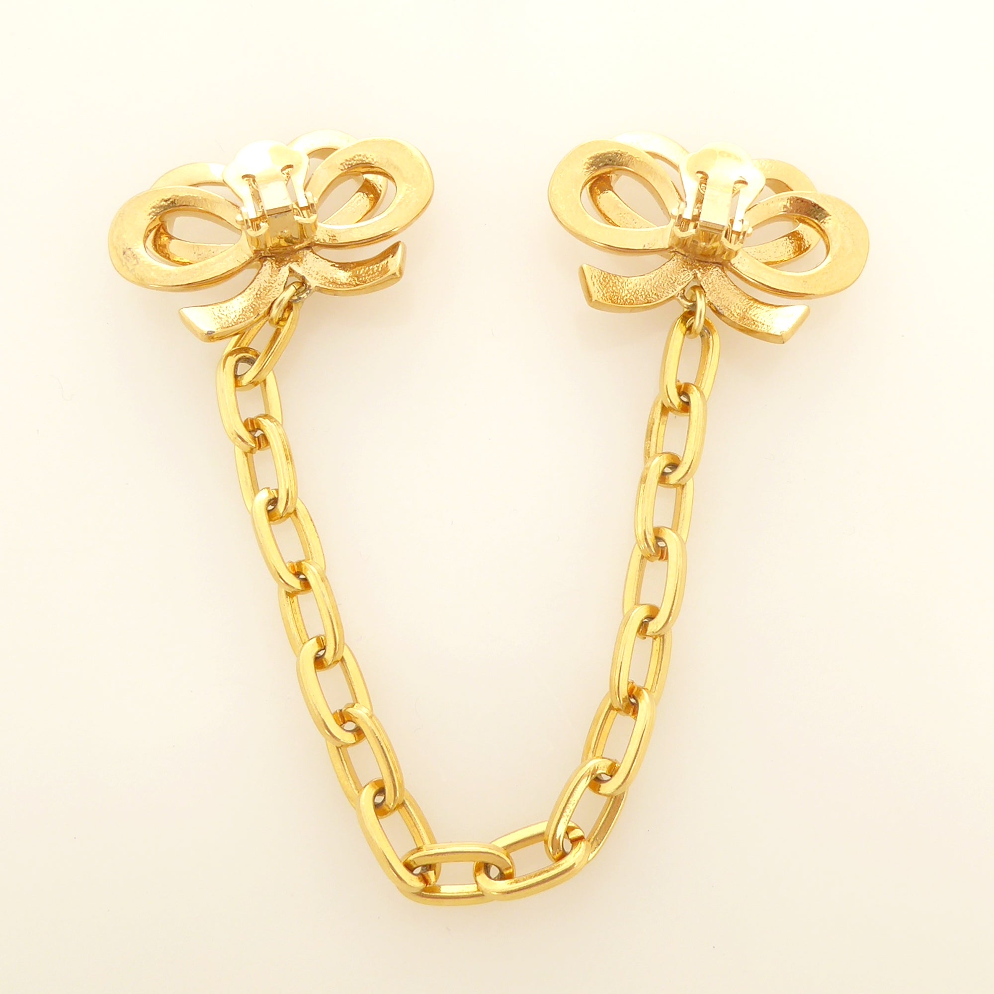 Gold bow collar clips by Jenny Dayco 5