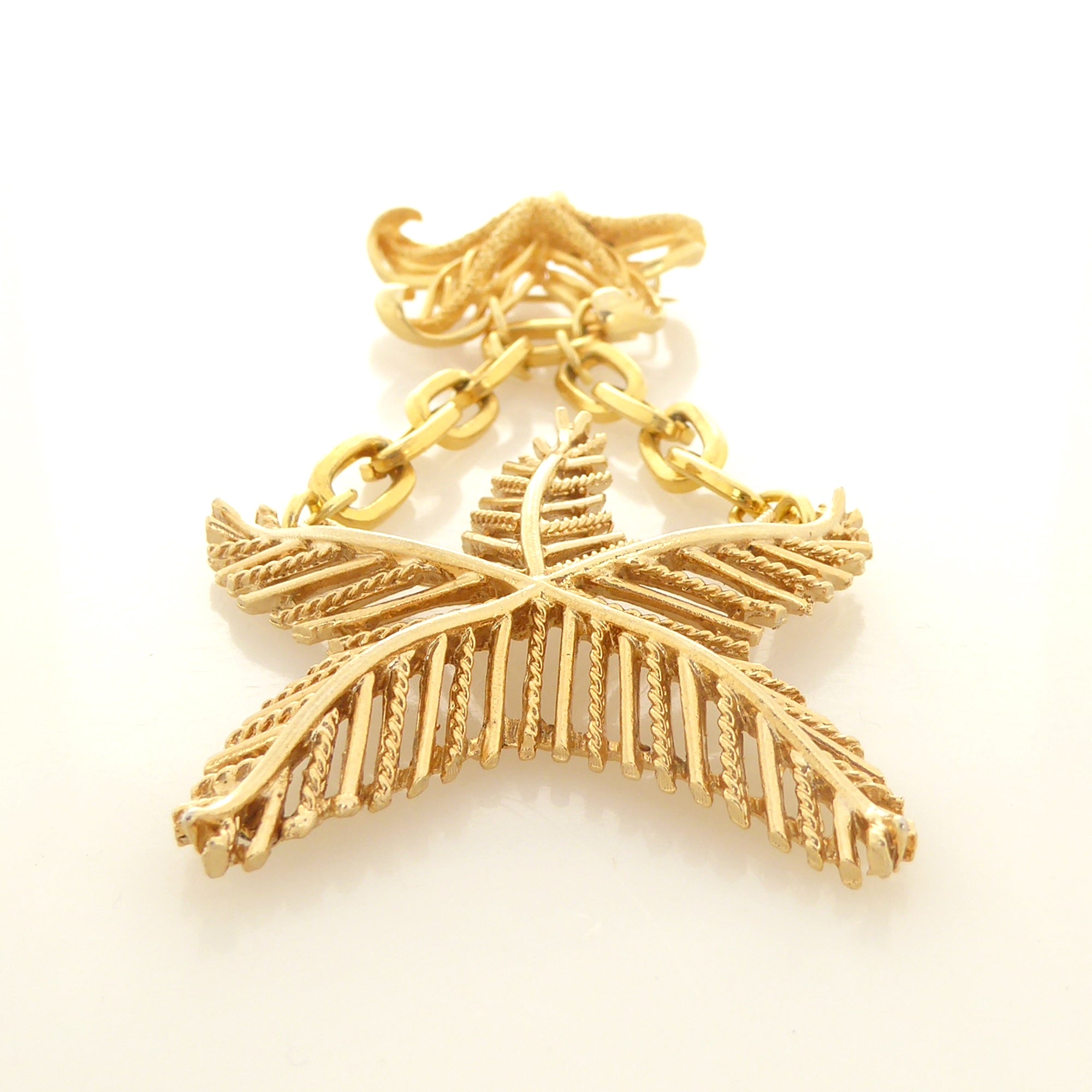 Gold starfish brooch by Jenny Dayco 3