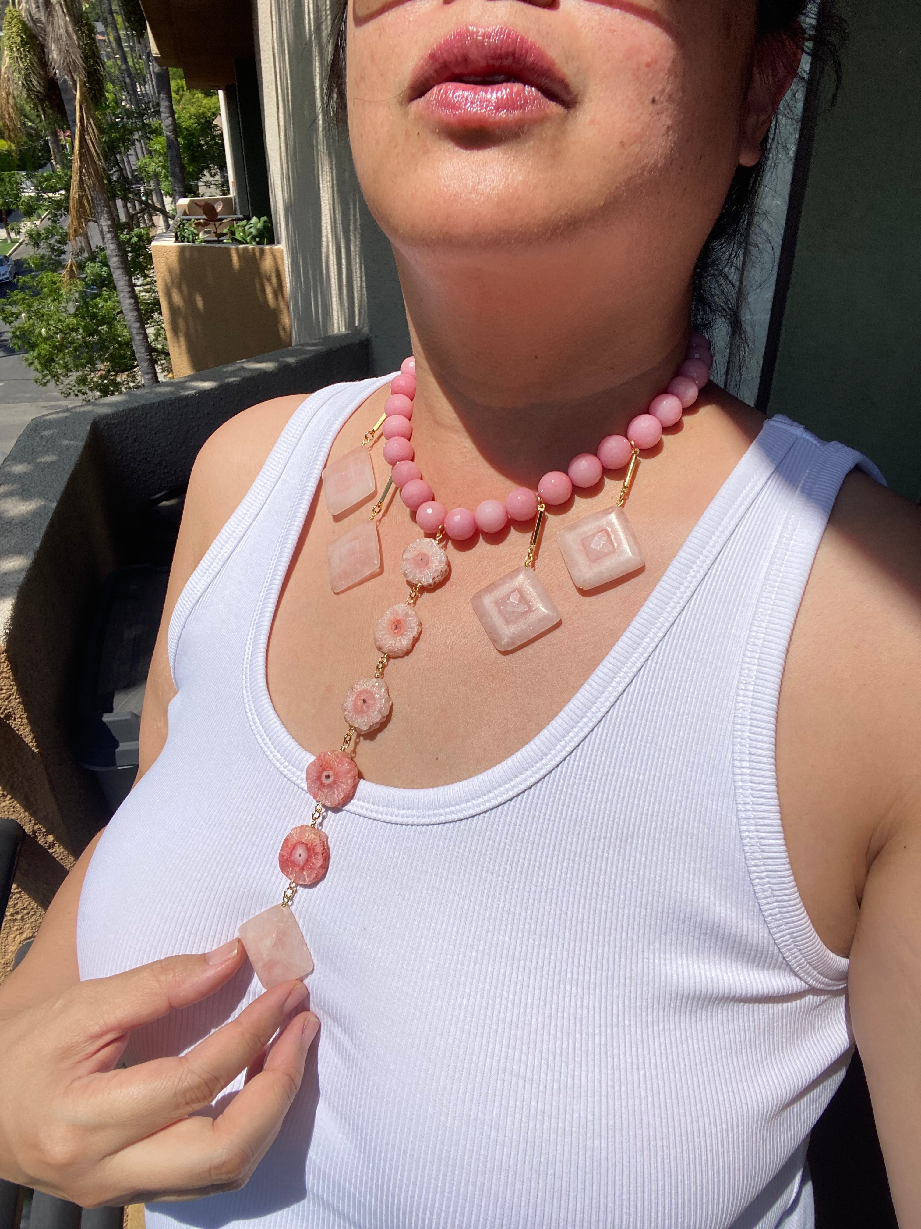 Jenny Dayco wearing a pink geometric stone necklace
