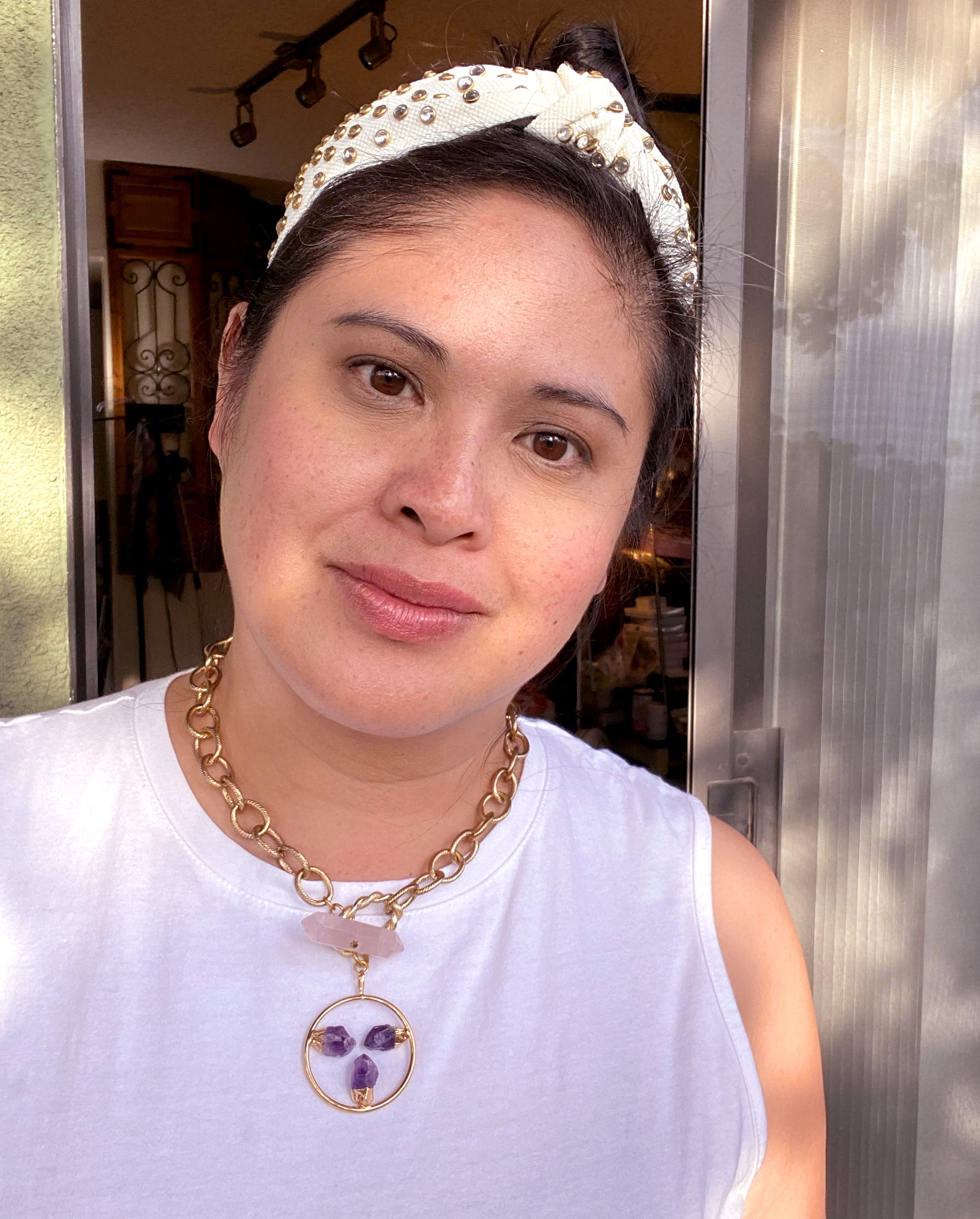 Jenny Dayco wearing and amethyst and rose toggle necklace
