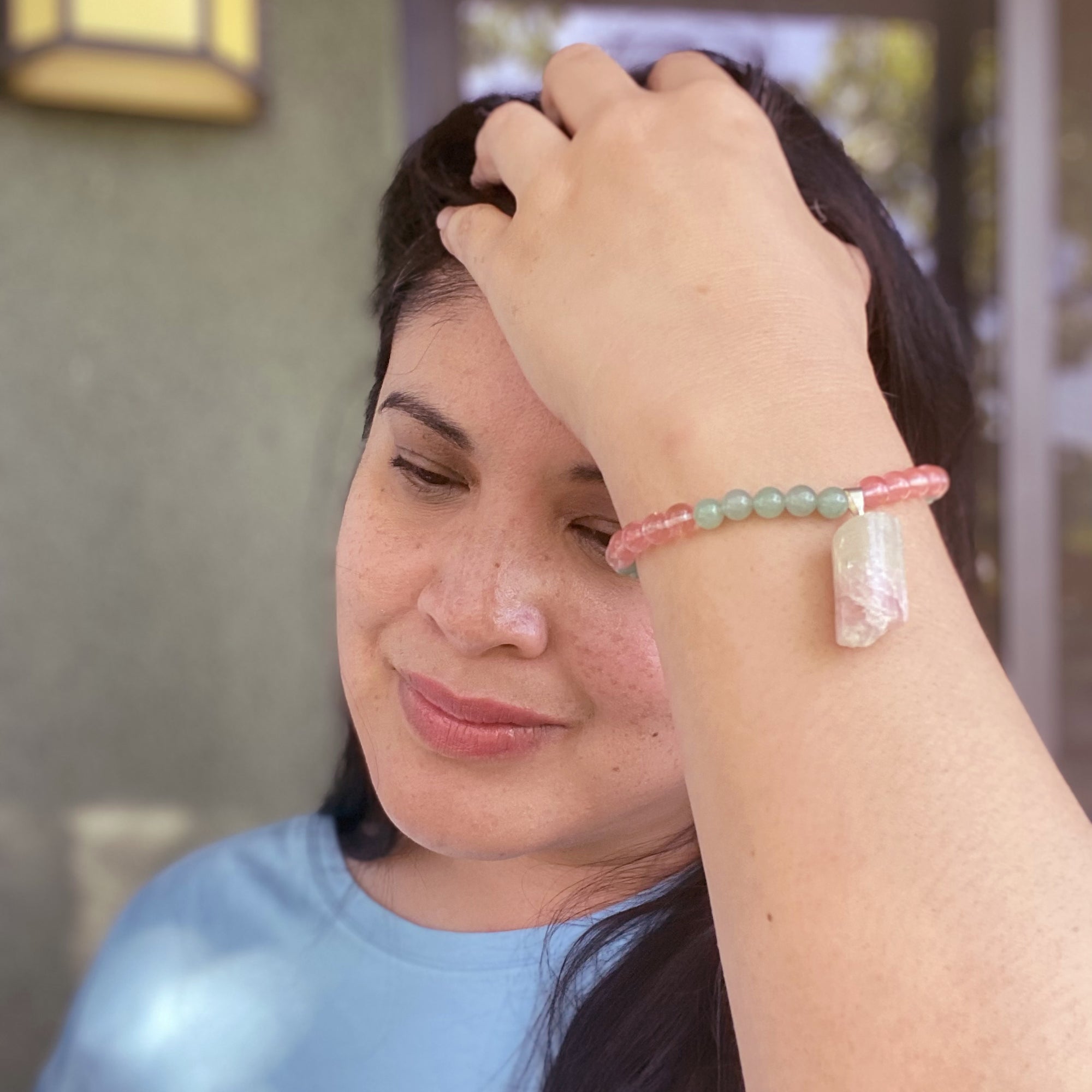 Jenny Dayco wearing a watermelon tourmaline bracelet