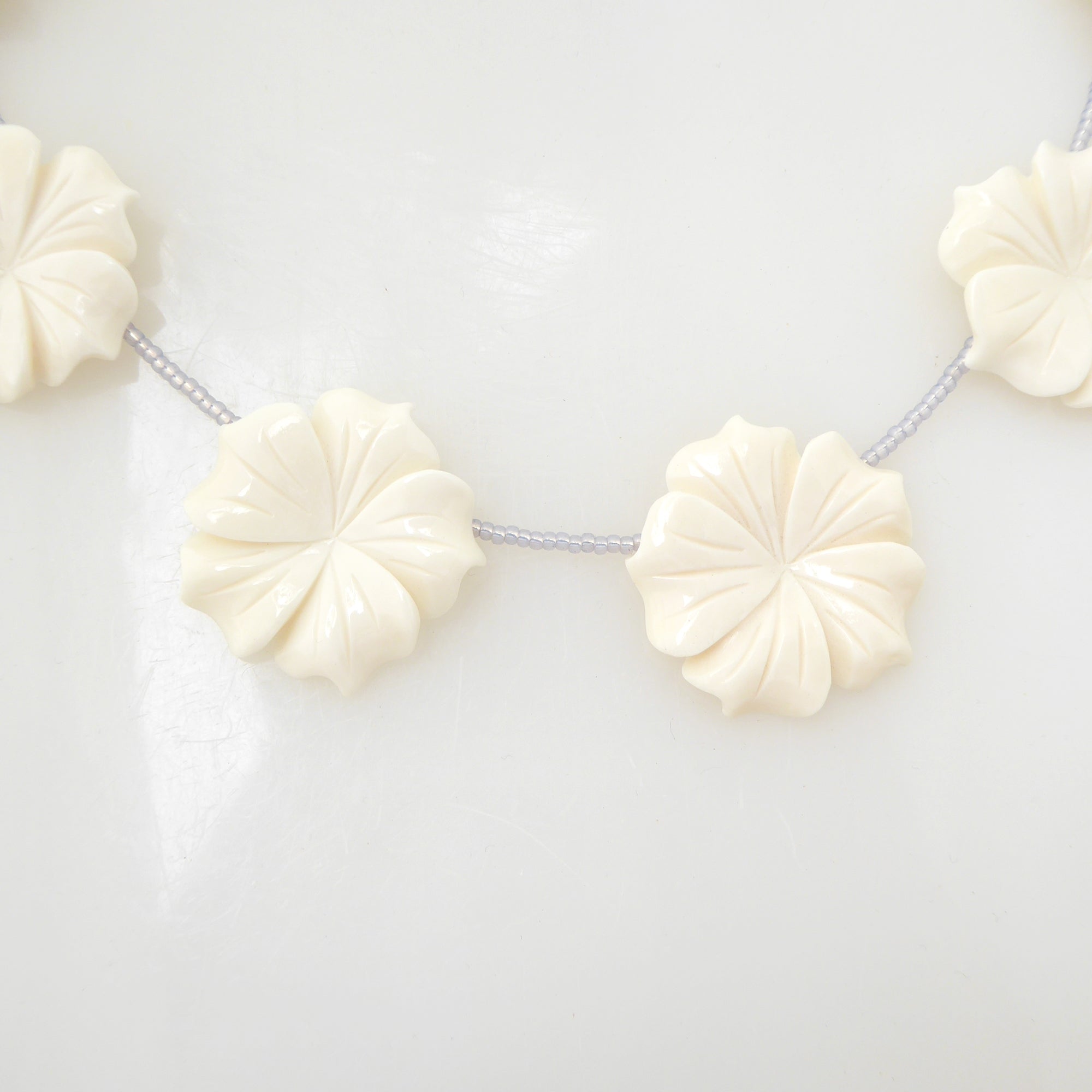 Carved flower beaded necklace by Jenny Dayco 4