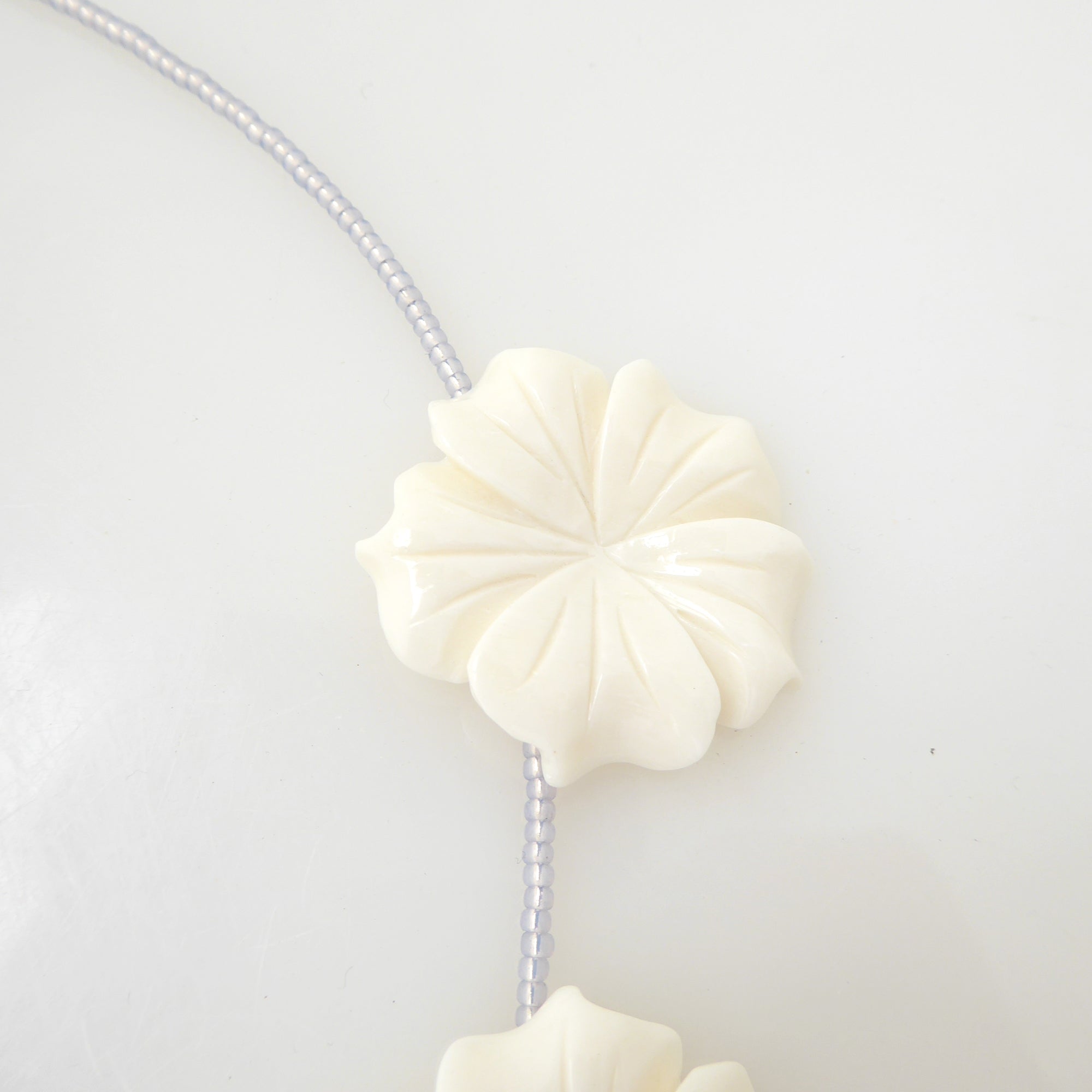 Carved flower beaded necklace by Jenny Dayco 5