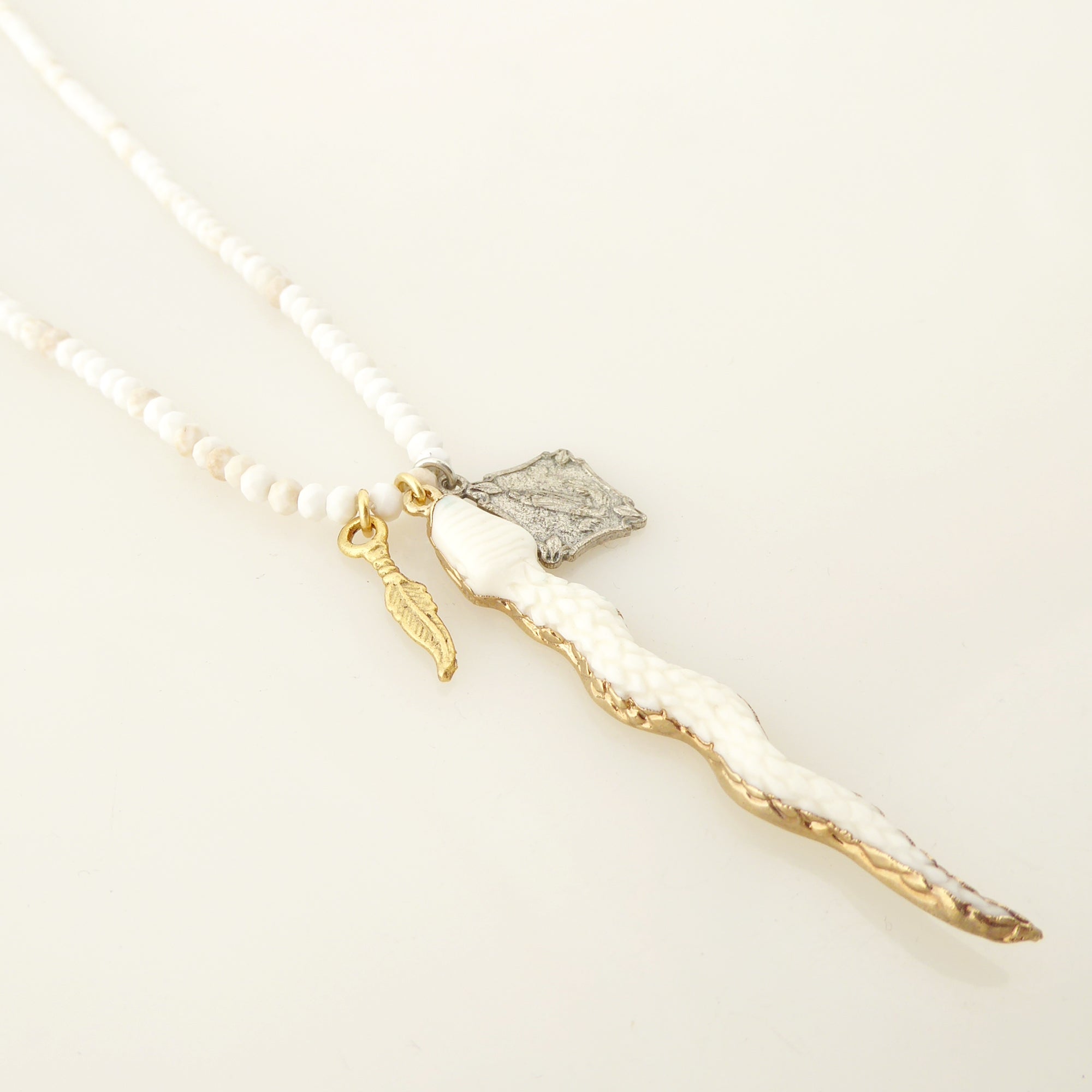 Carved snake pendant necklace by Jenny Dayco 2