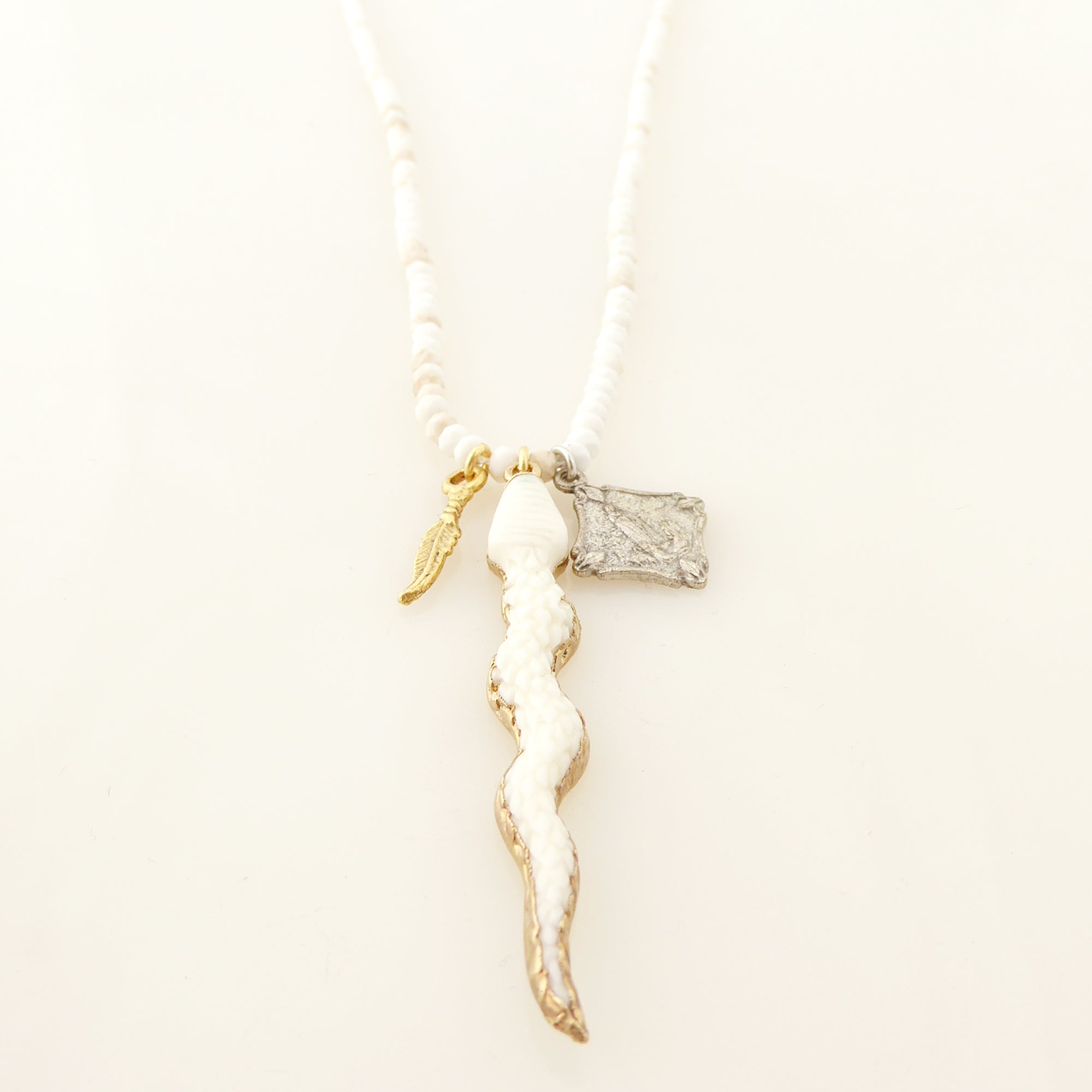 Carved snake pendant necklace by Jenny Dayco 3