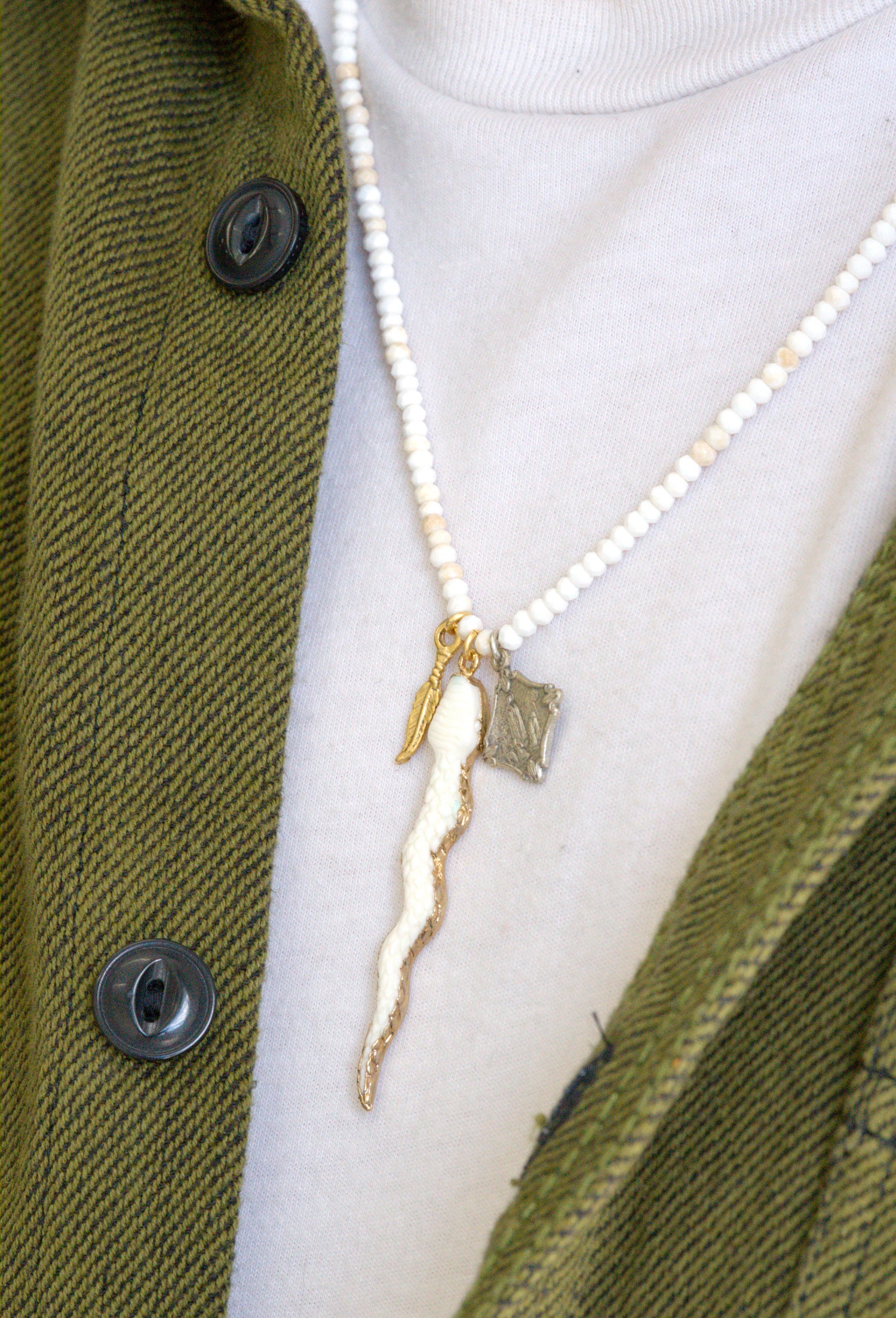 Carved snake pendant necklace by Jenny Dayco 8