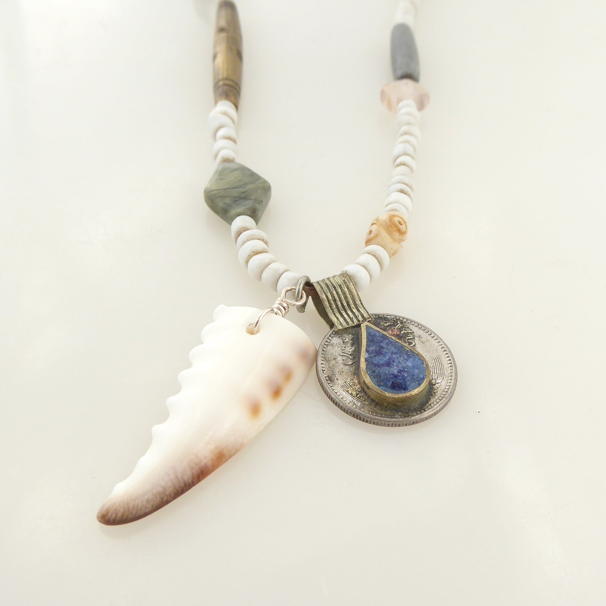 Cowrie shell and lapis lazuli coin necklace by Jenny Dayco 3