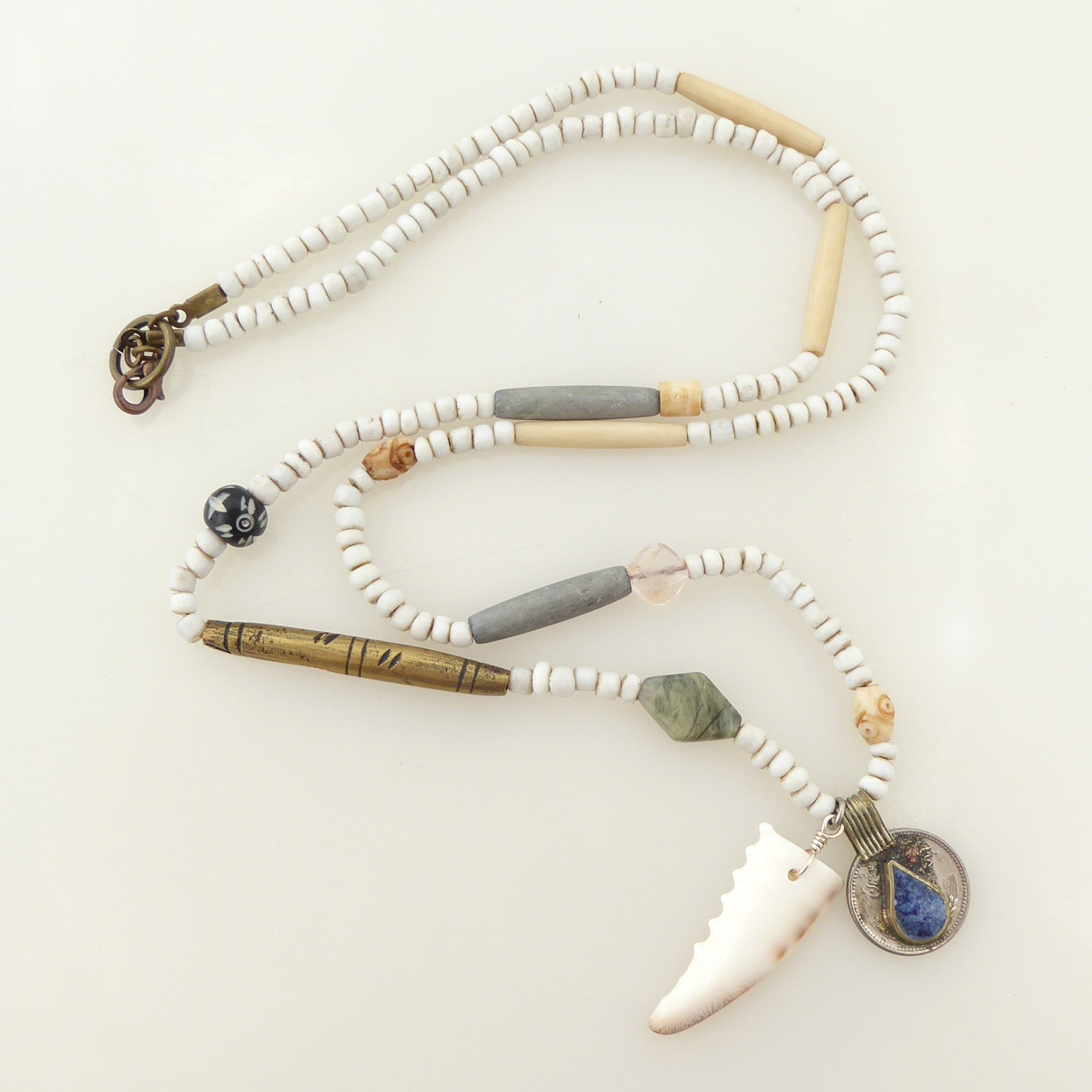 Cowrie shell and lapis lazuli coin necklace by Jenny Dayco 6