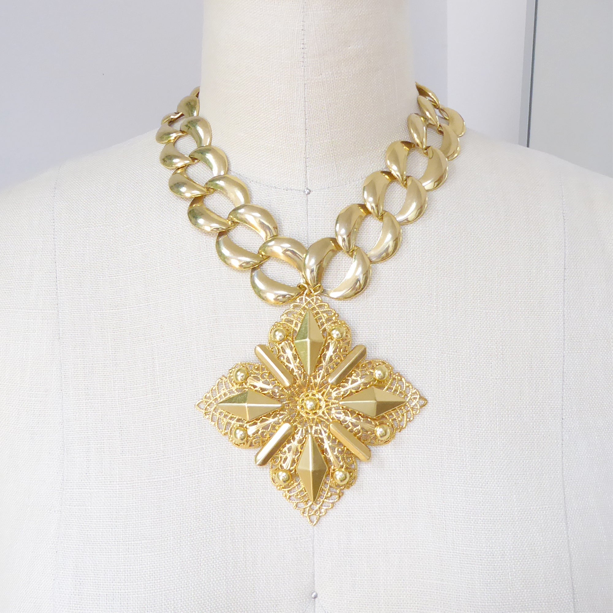 Gold medieval cross necklace by Jenny Dayco 7