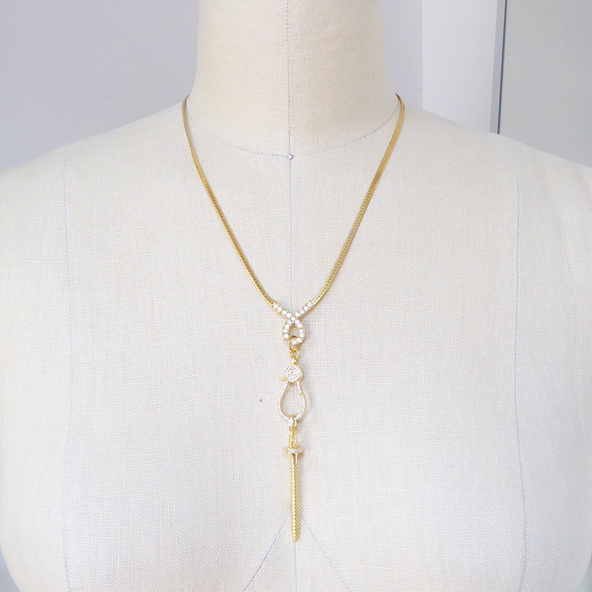 Gold pave screw necklace by Jenny Dayco 6