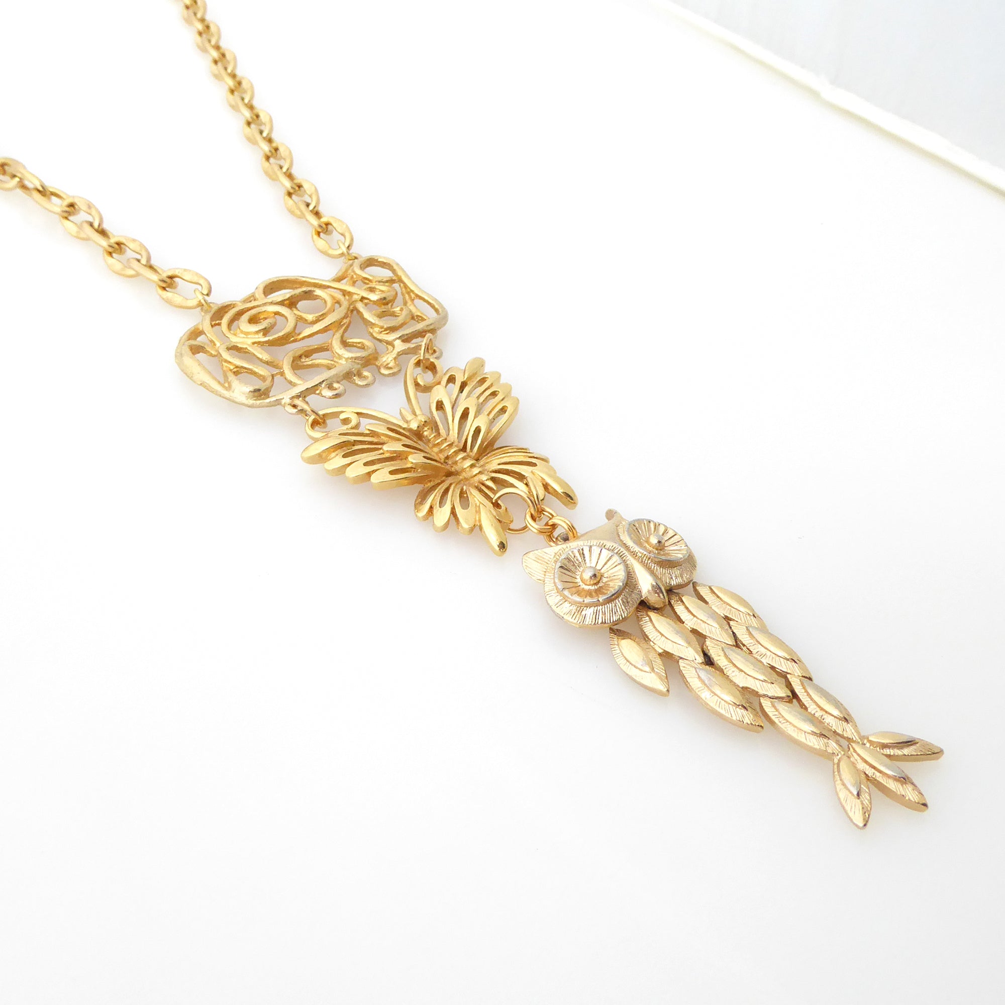 Gold butterfly and owl necklace by Jenny Dayco 2