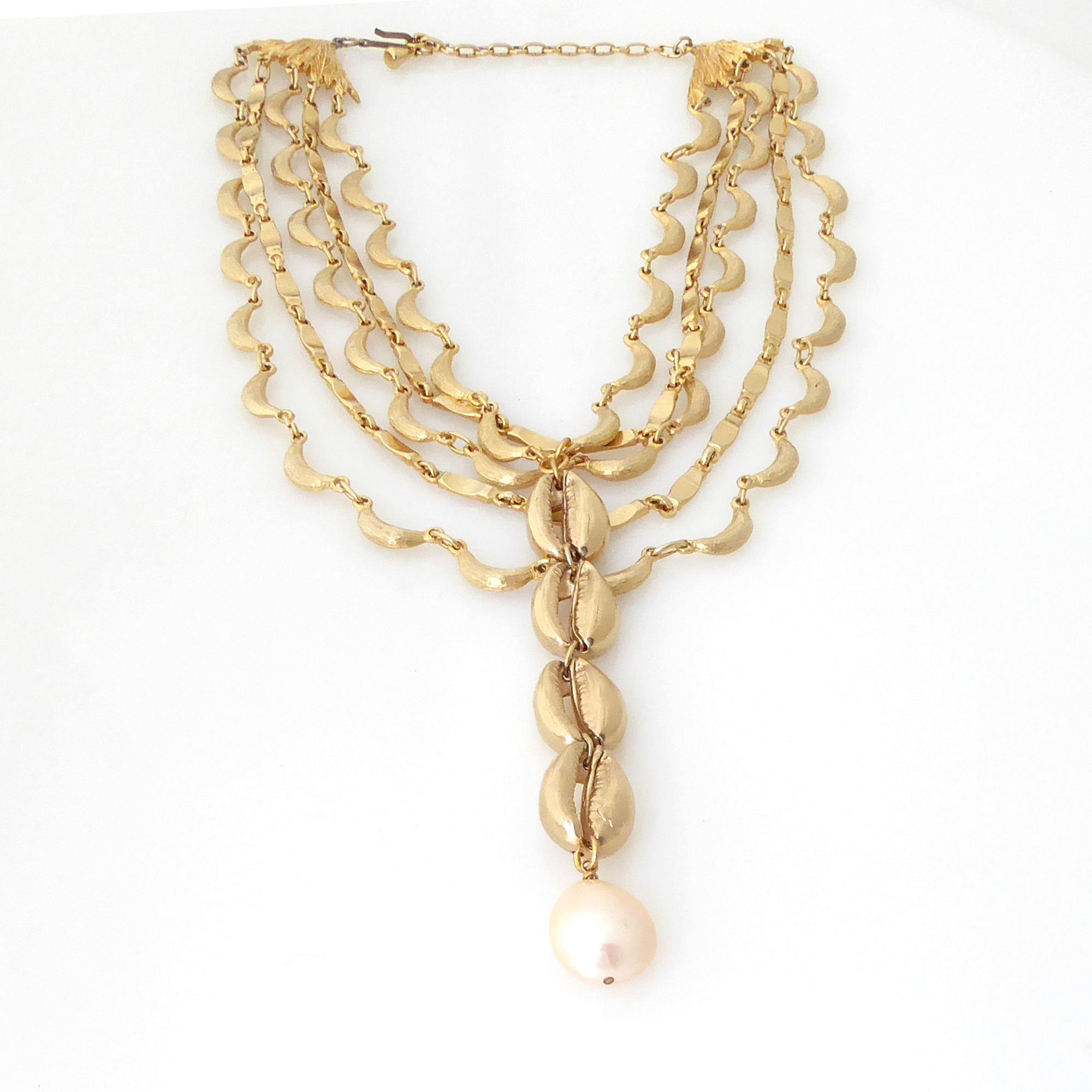 Gold cowrie shell and pearl necklace by Jenny Dayco 3