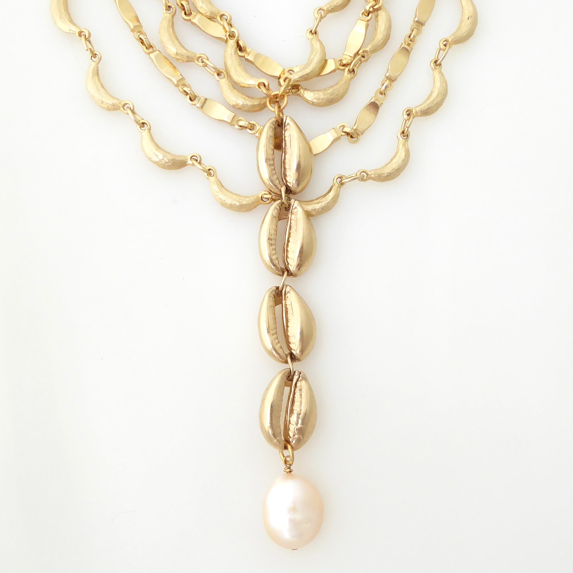 Gold cowrie shell and pearl necklace by Jenny Dayco 4