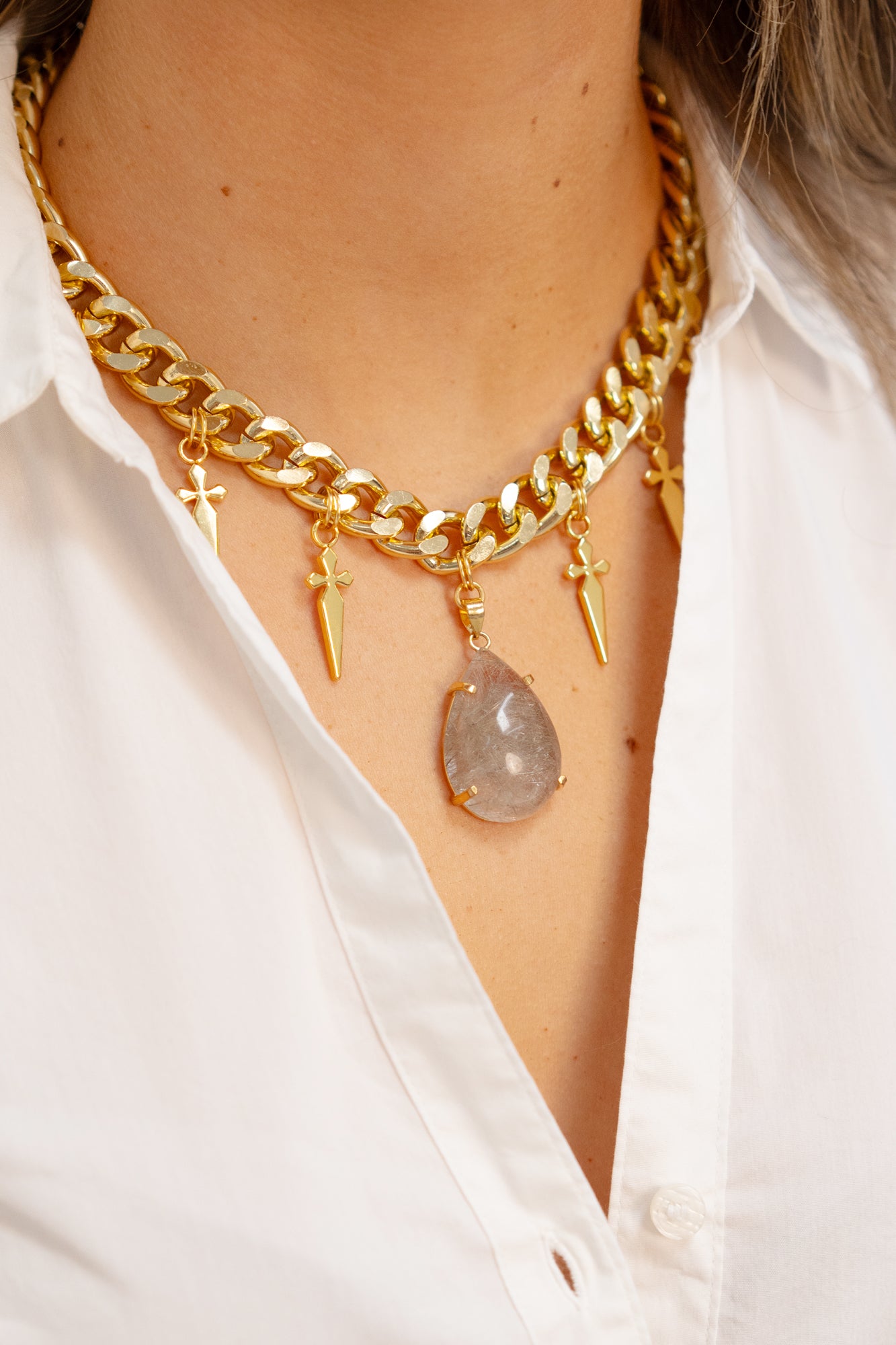 Golden rutilated quartz teardrop necklace by Jenny Dayco 1