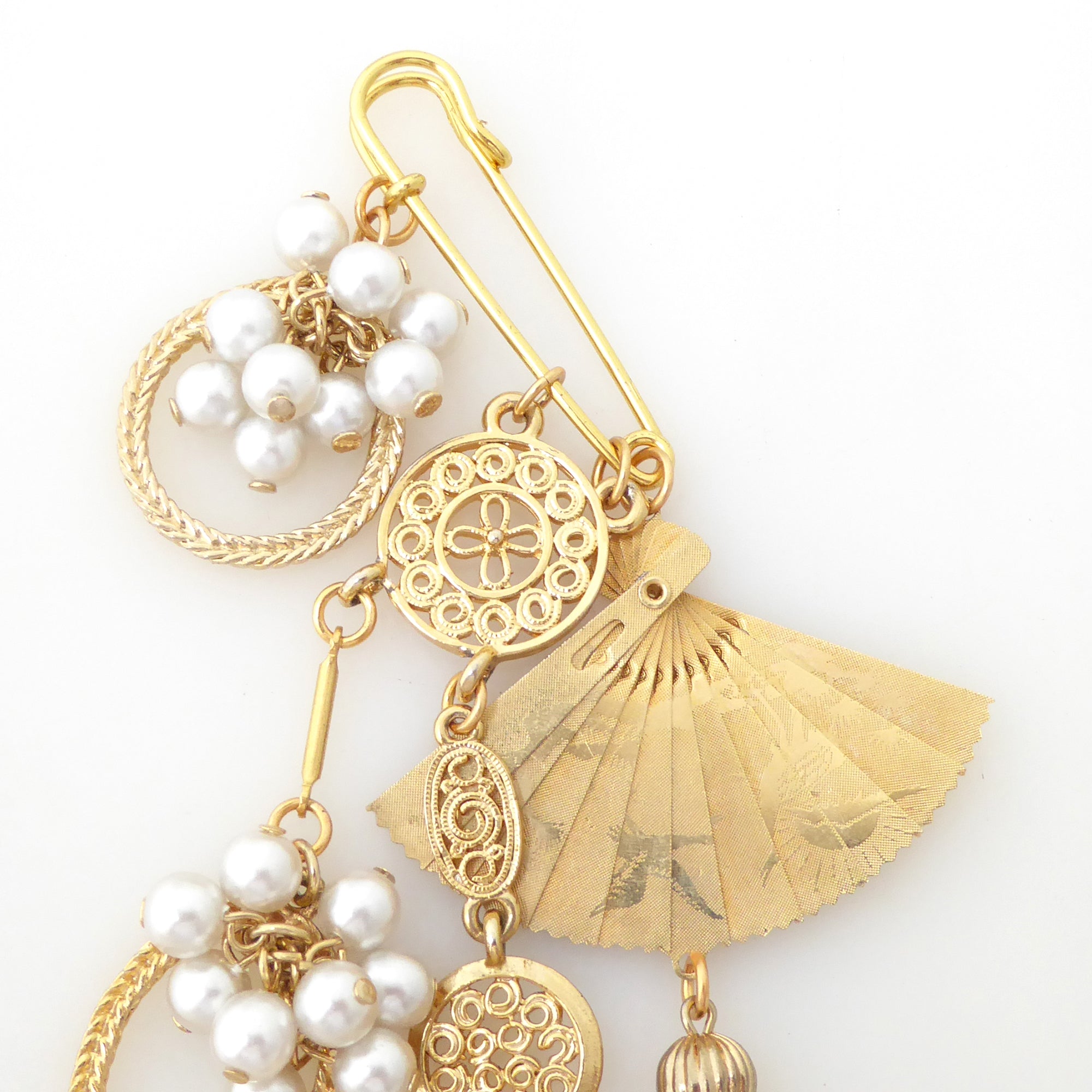 Golden fan tassel and pearl brooch by Jenny Dayco 5