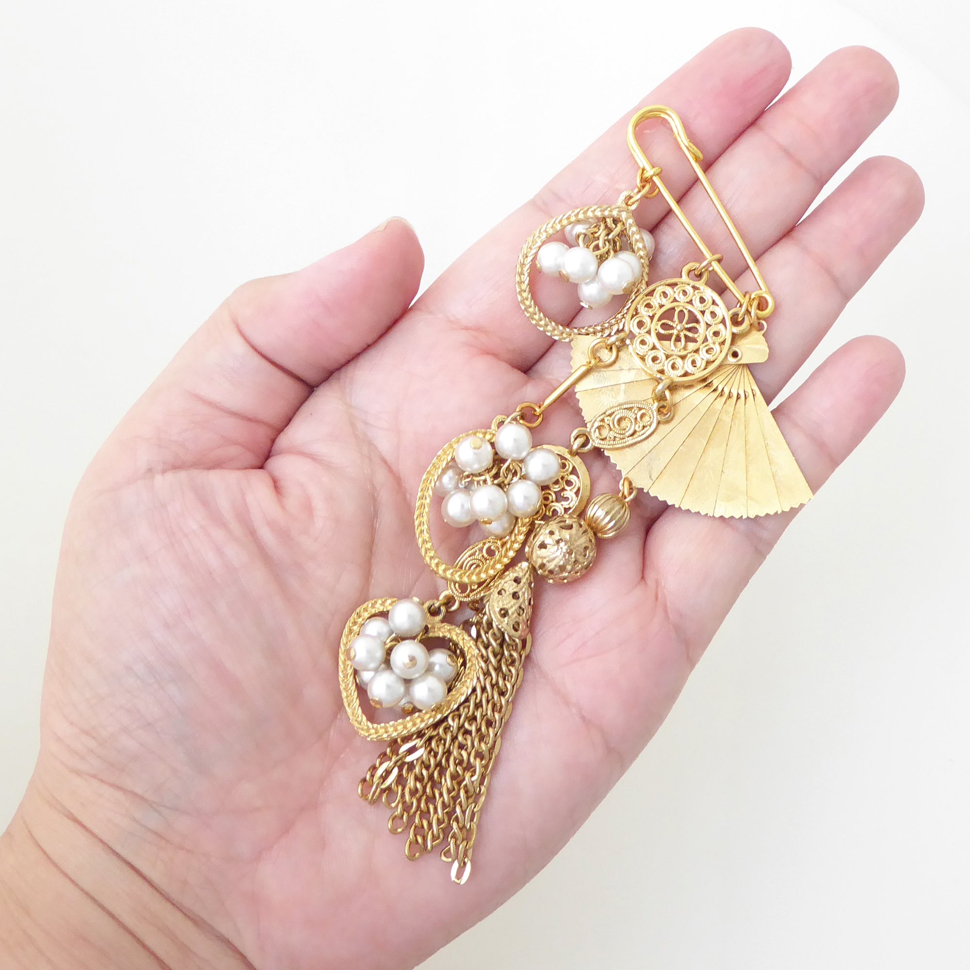 Golden fan tassel and pearl brooch by Jenny Dayco 6