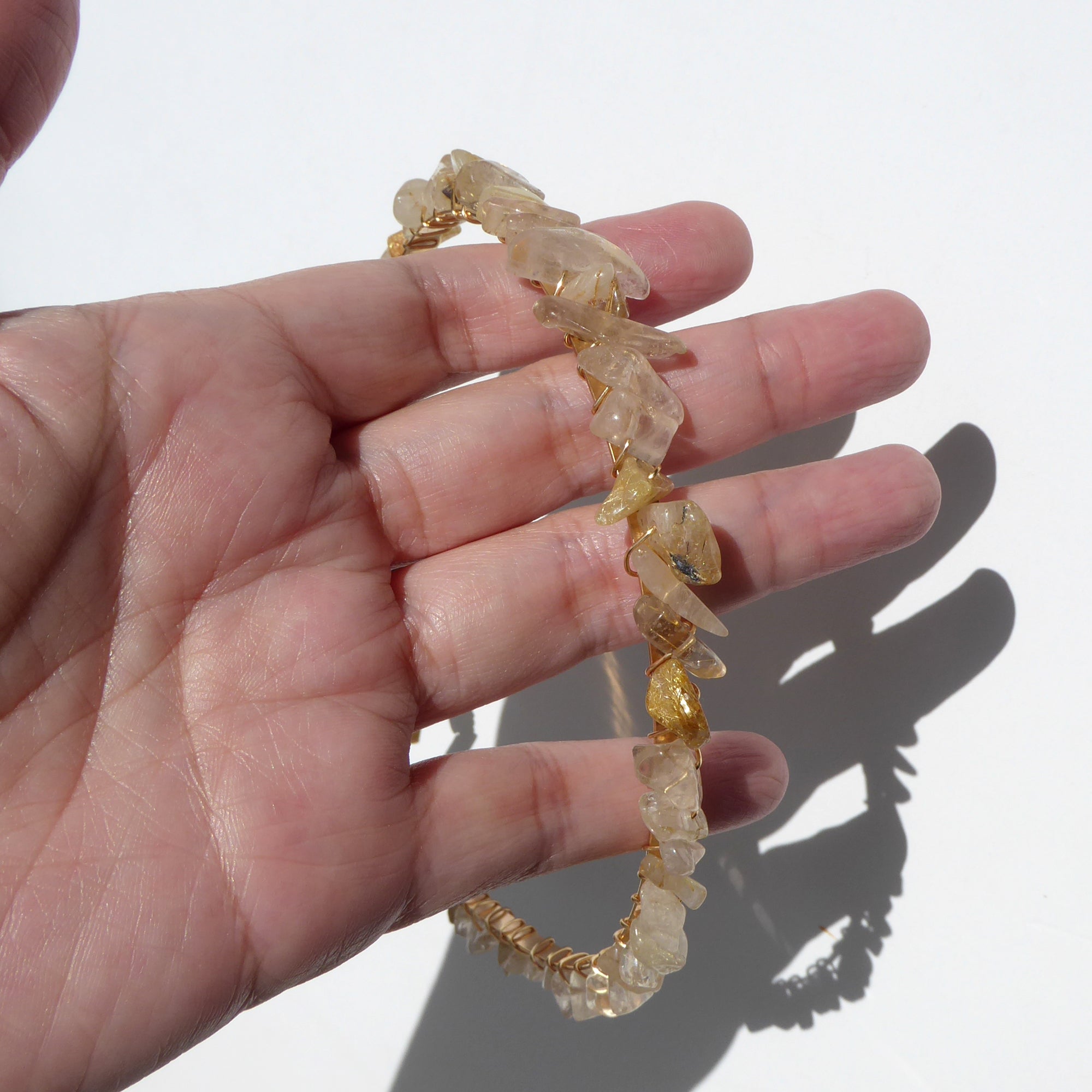 Golden rutilated quartz headband by Jenny Dayco 9