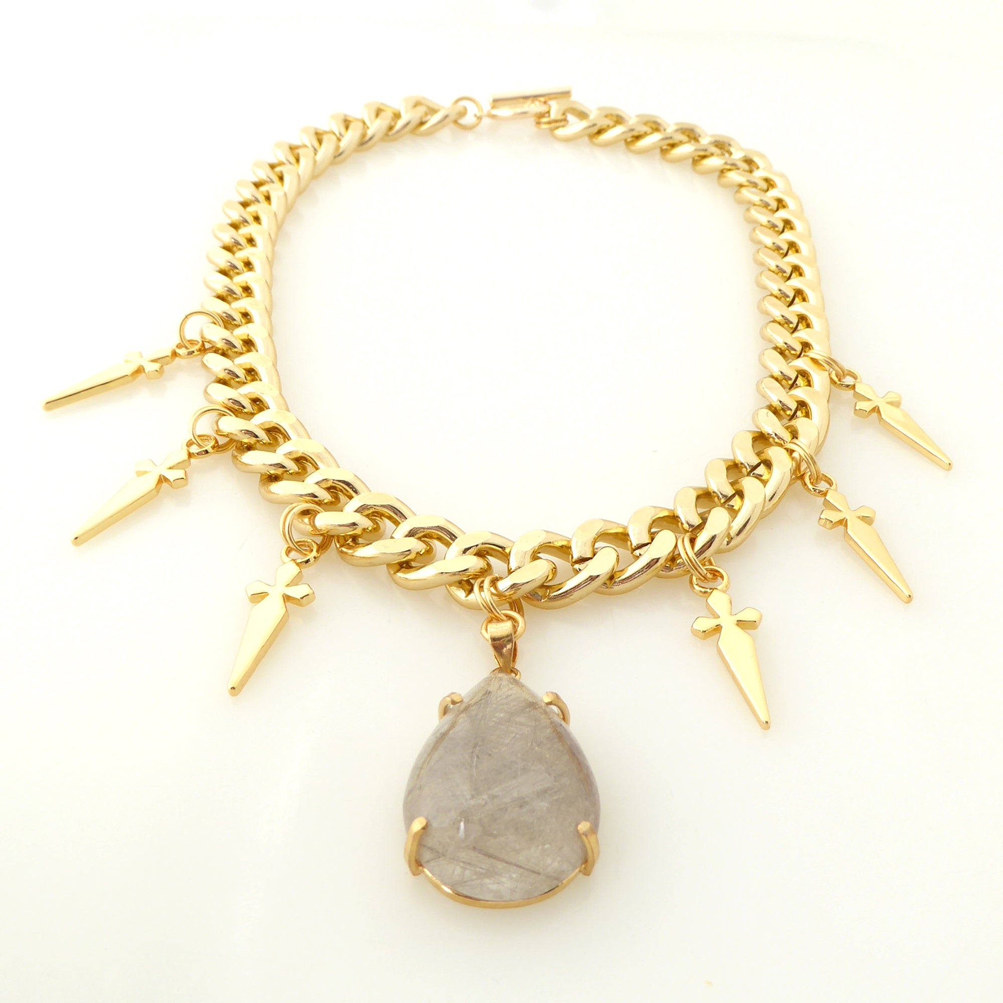 Golden rutilated quartz teardrop and dagger necklace Jenny Dayco 3