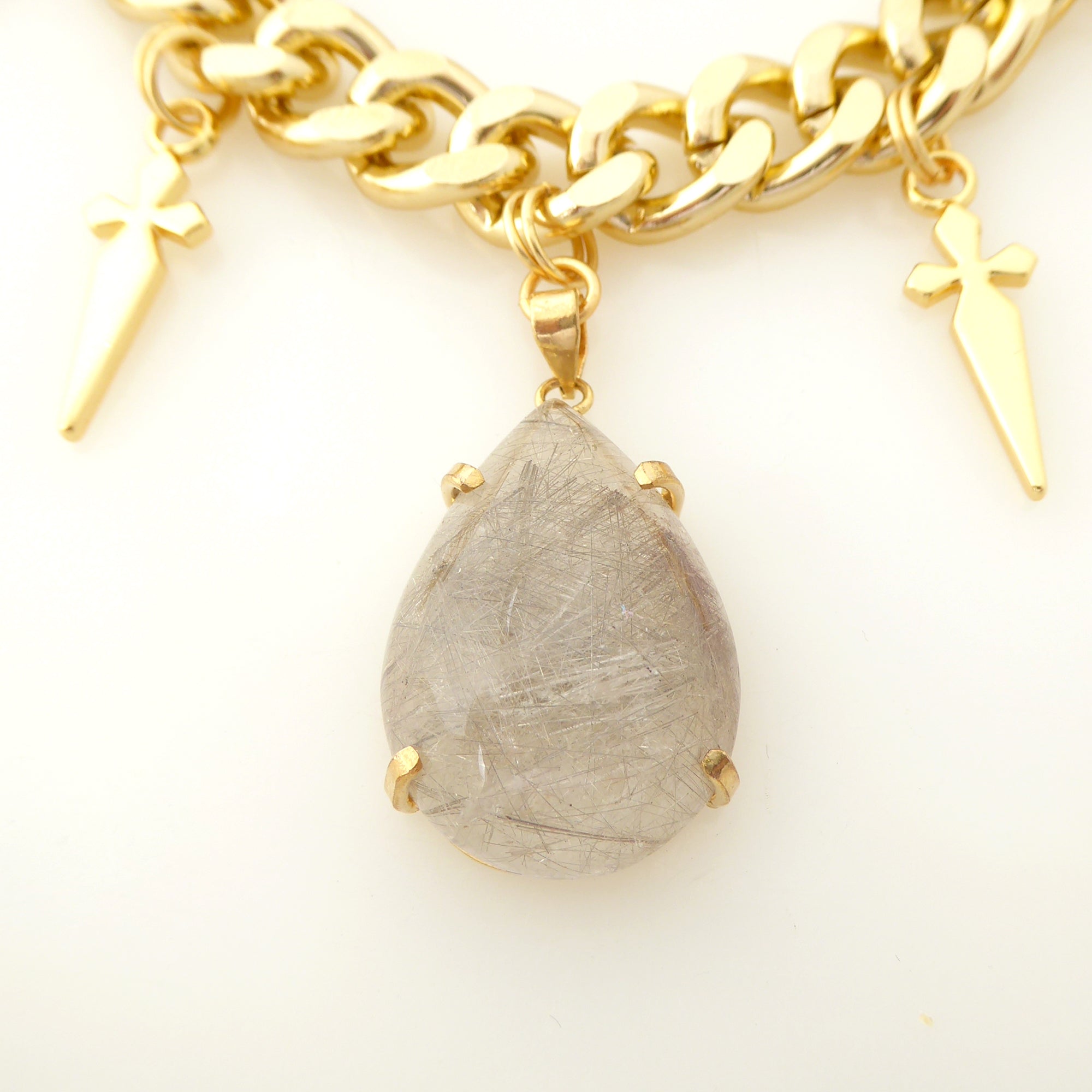 Golden rutilated quartz teardrop and dagger necklace Jenny Dayco 4