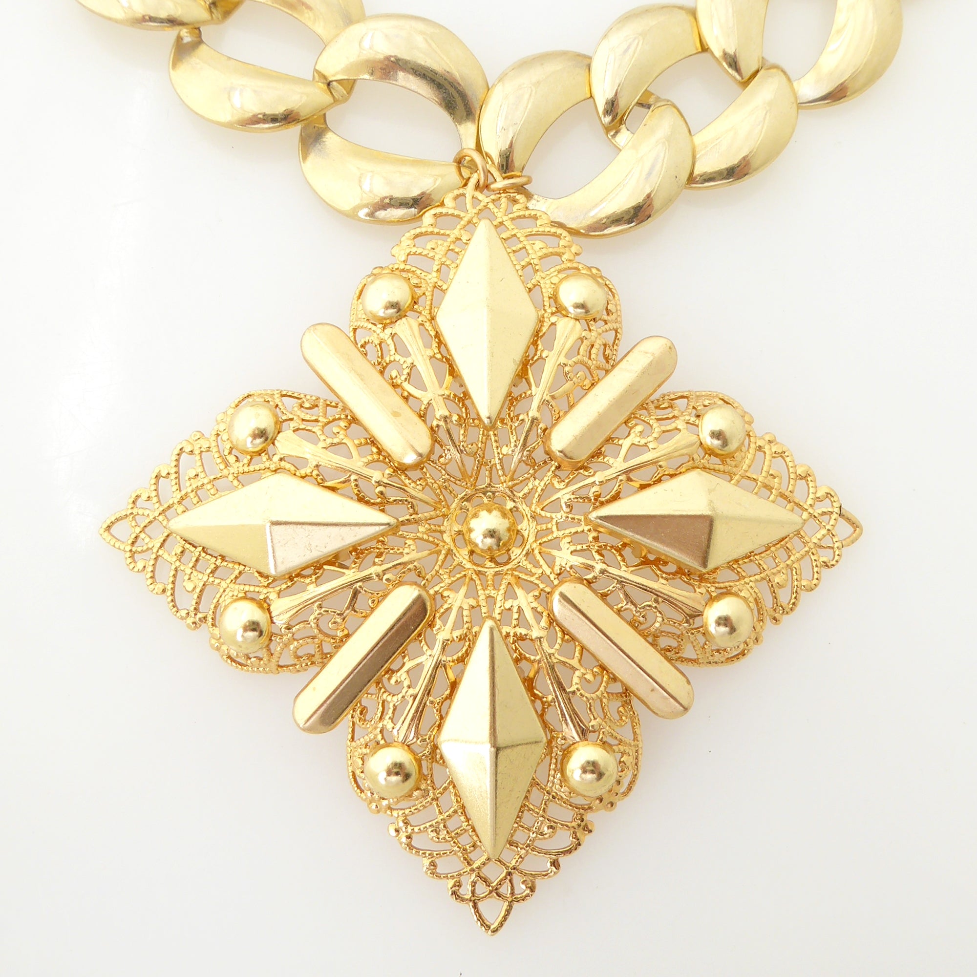 Gold medieval cross necklace by Jenny Dayco 4