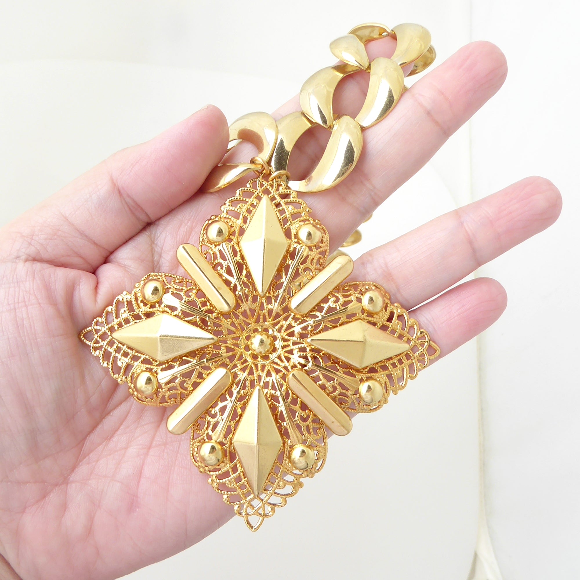 Gold medieval cross necklace by Jenny Dayco 6