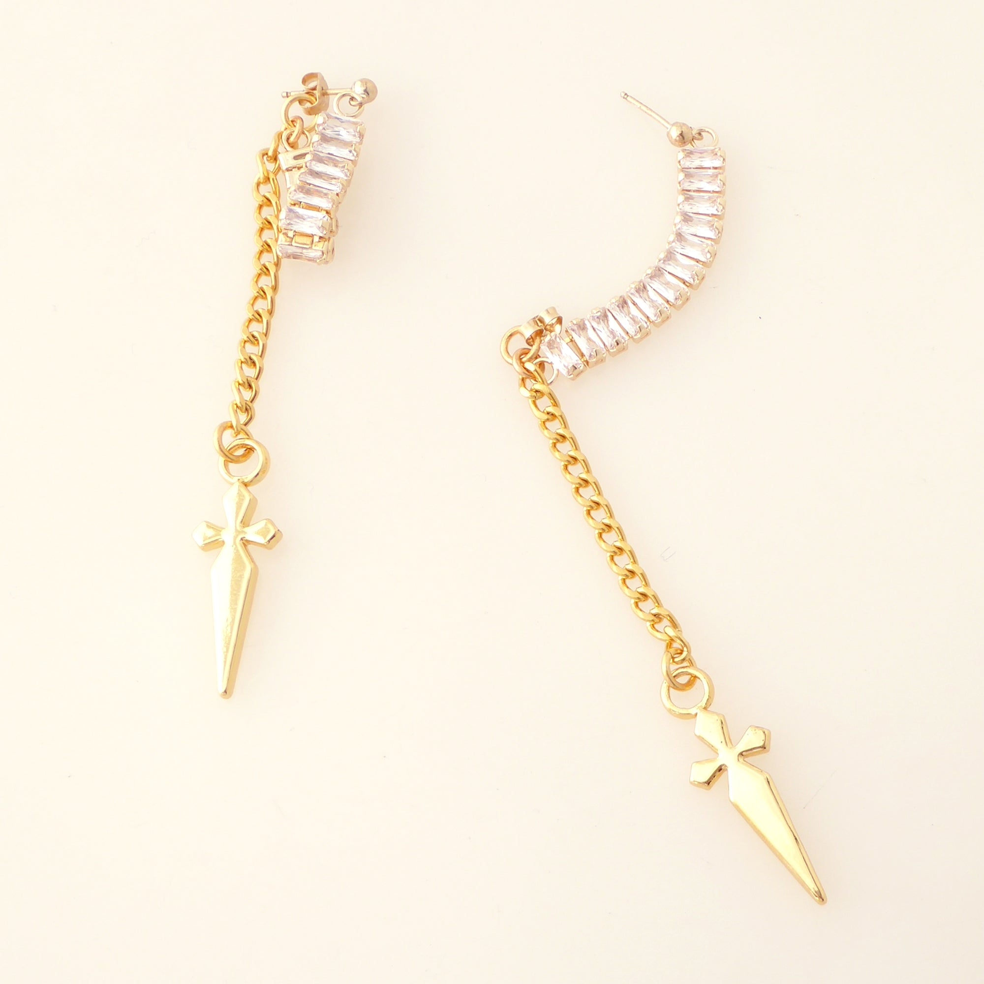 Gold rhinestone baguette dagger earrings