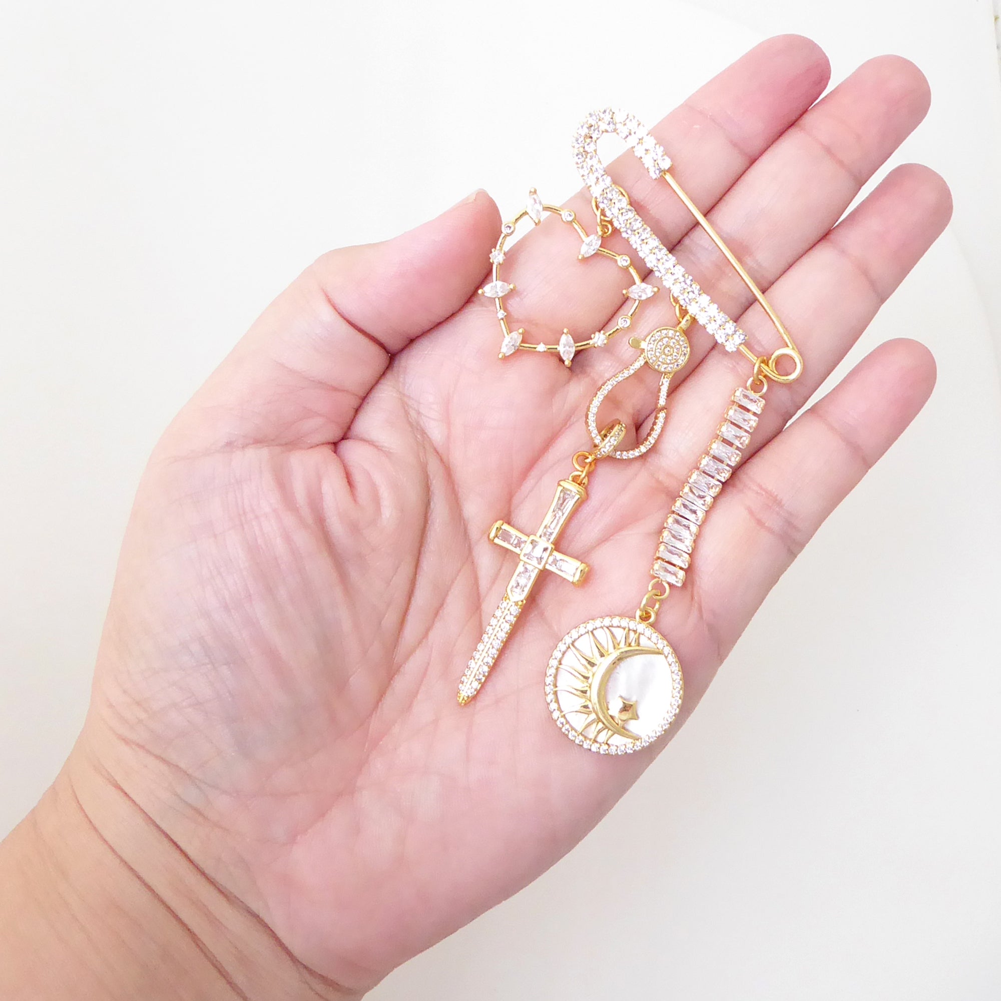 Gold rhinestone symbol heart dagger moon sword star brooch by Jenny Dayco 6