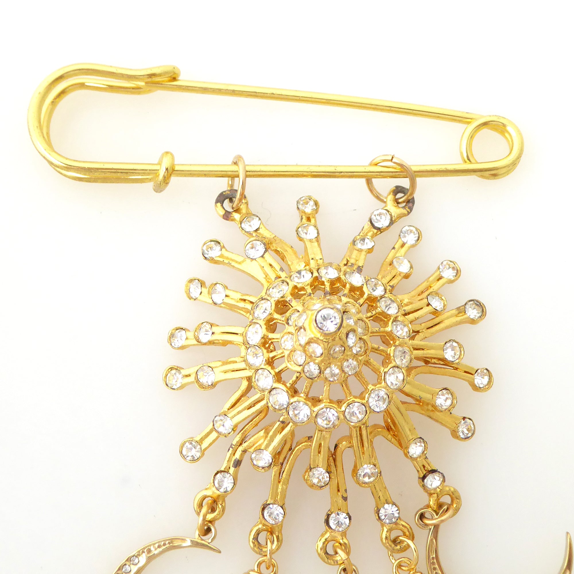 Gold suncatcher moon and dagger brooch by Jenny Dayco 5