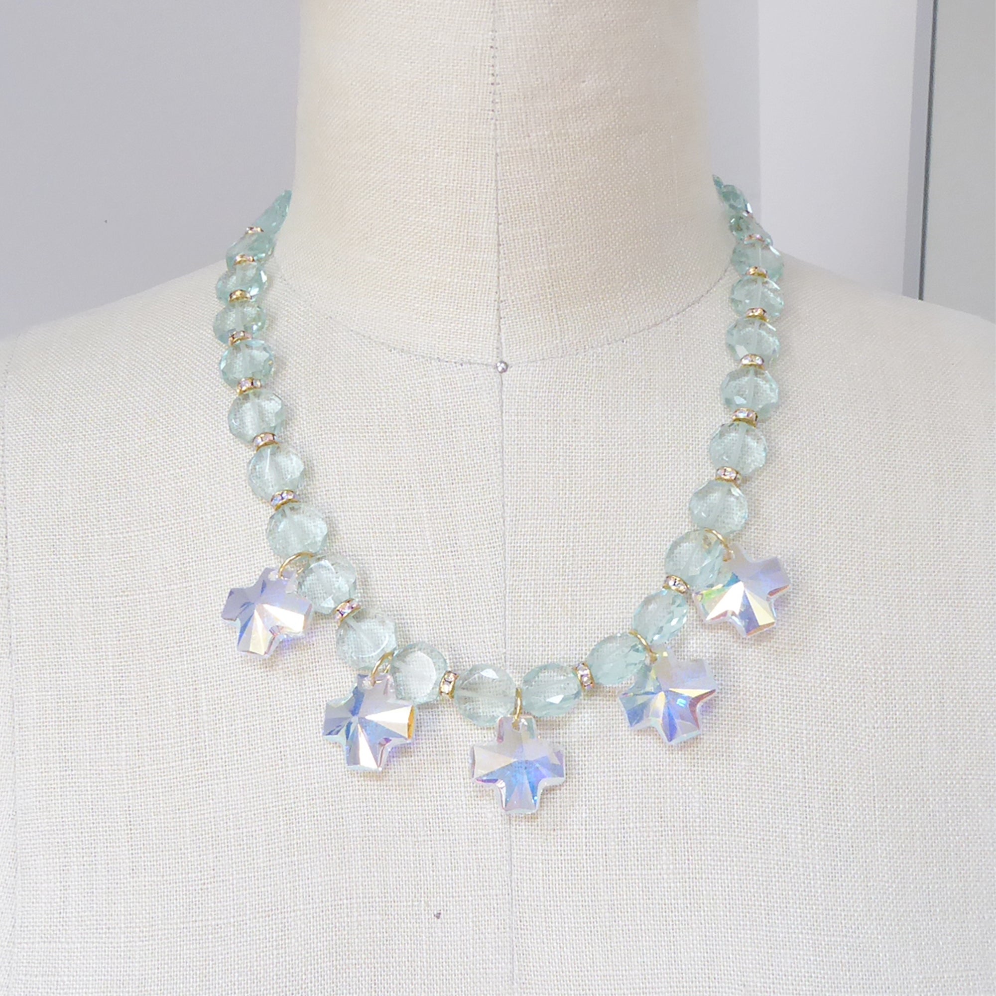 Iridescent crystal cross necklace by Jenny Dayco 9