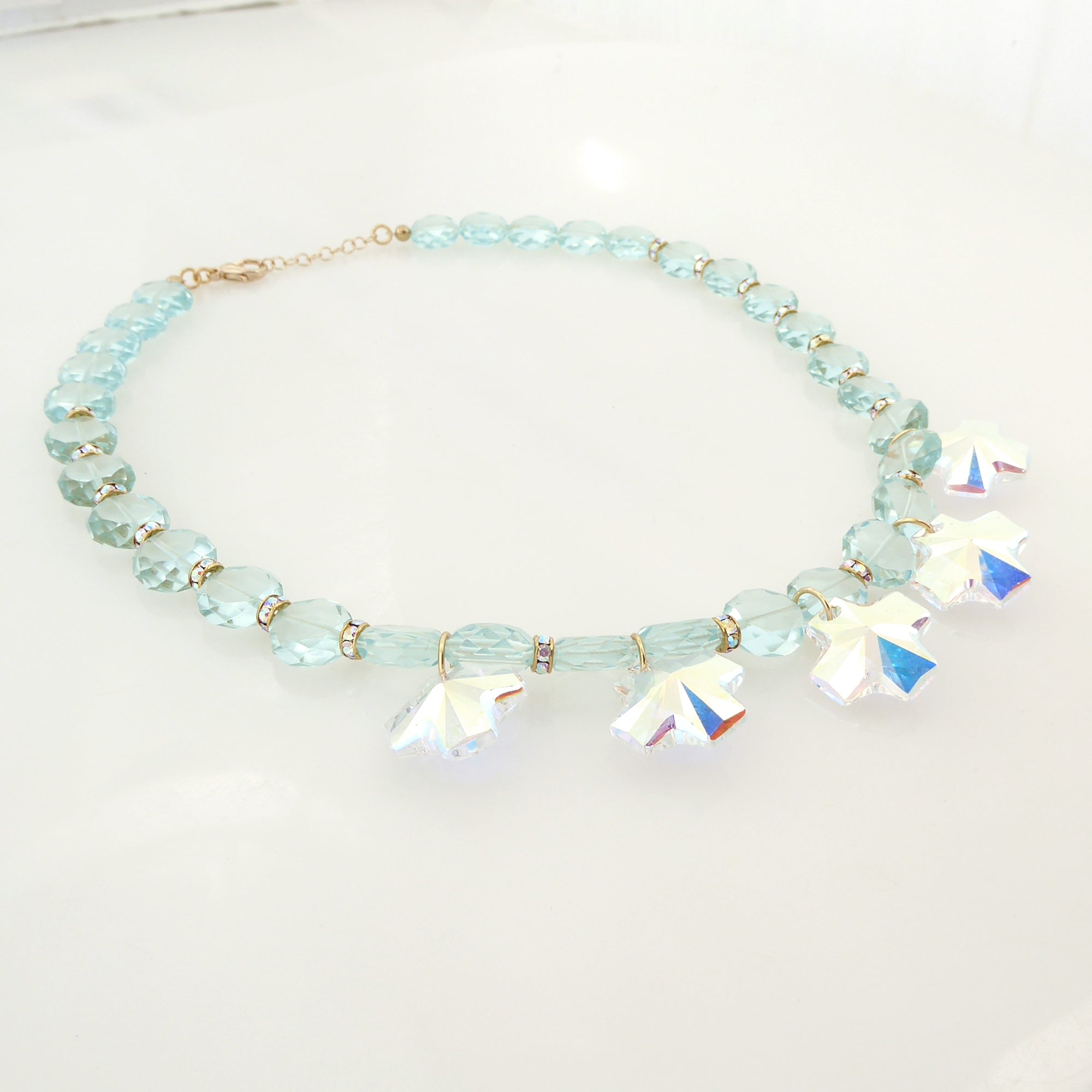 Iridescent crystal cross necklace by Jenny Dayco 2