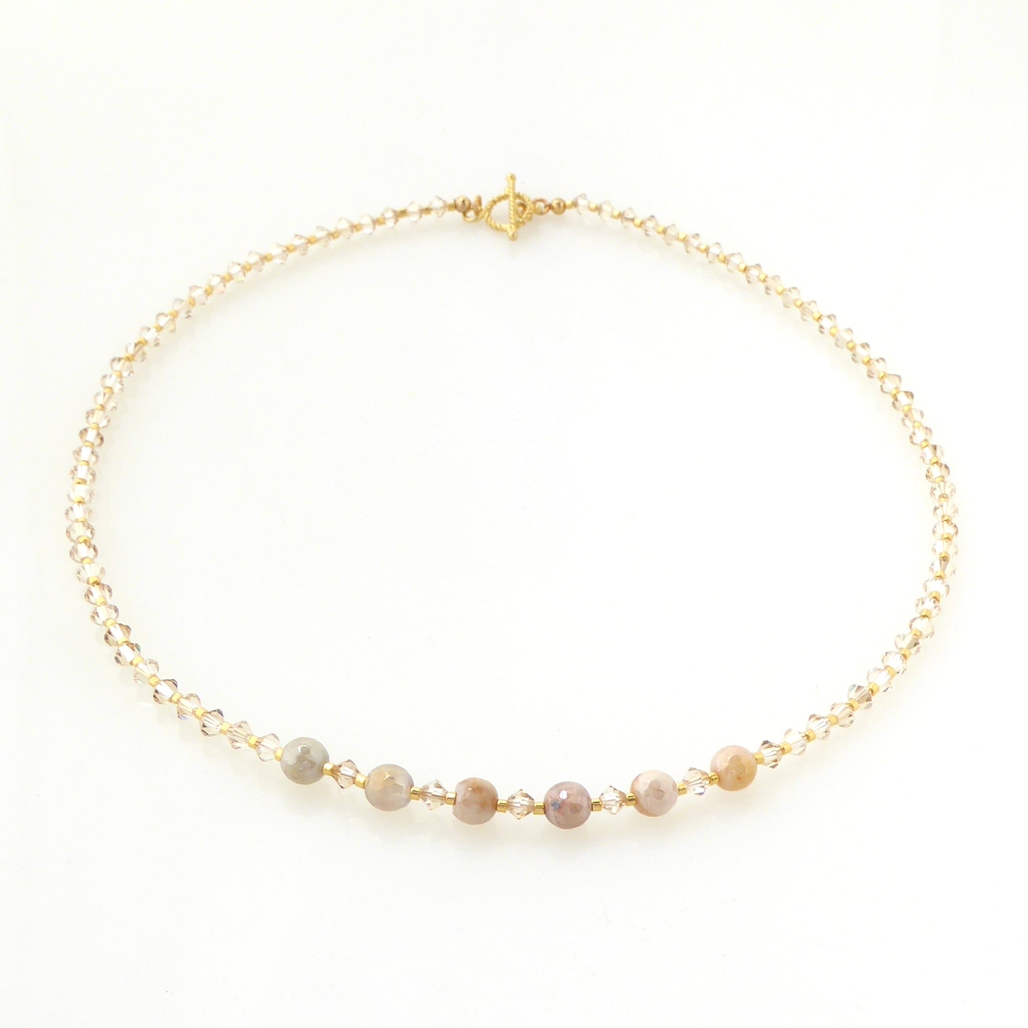 Iridescent peach moonstone beaded necklace by Jenny Dayco 