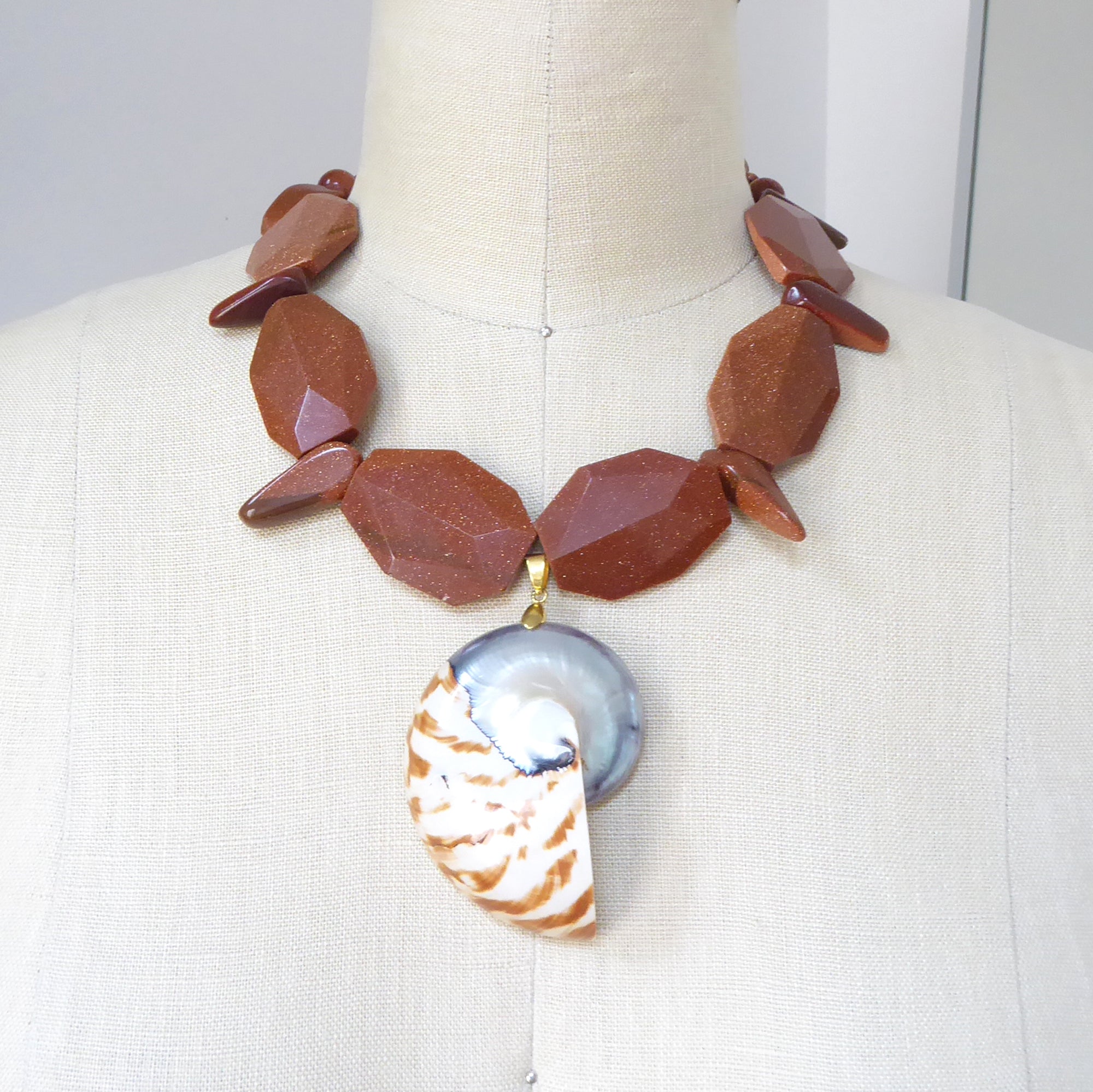 Nautilus shell and goldstone necklace by Jenny Dayco 7