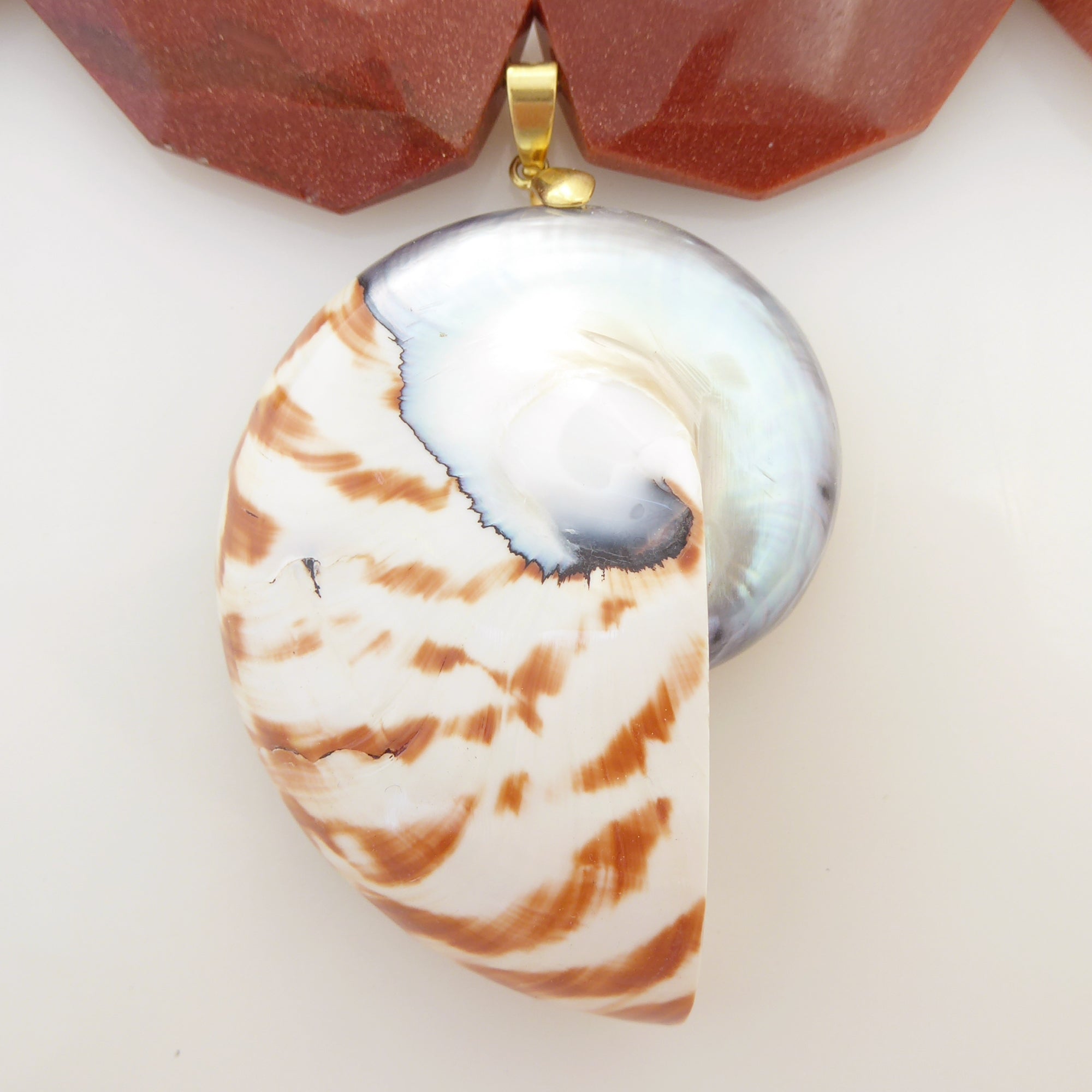 Nautilus shell and goldstone necklace by Jenny Dayco 4