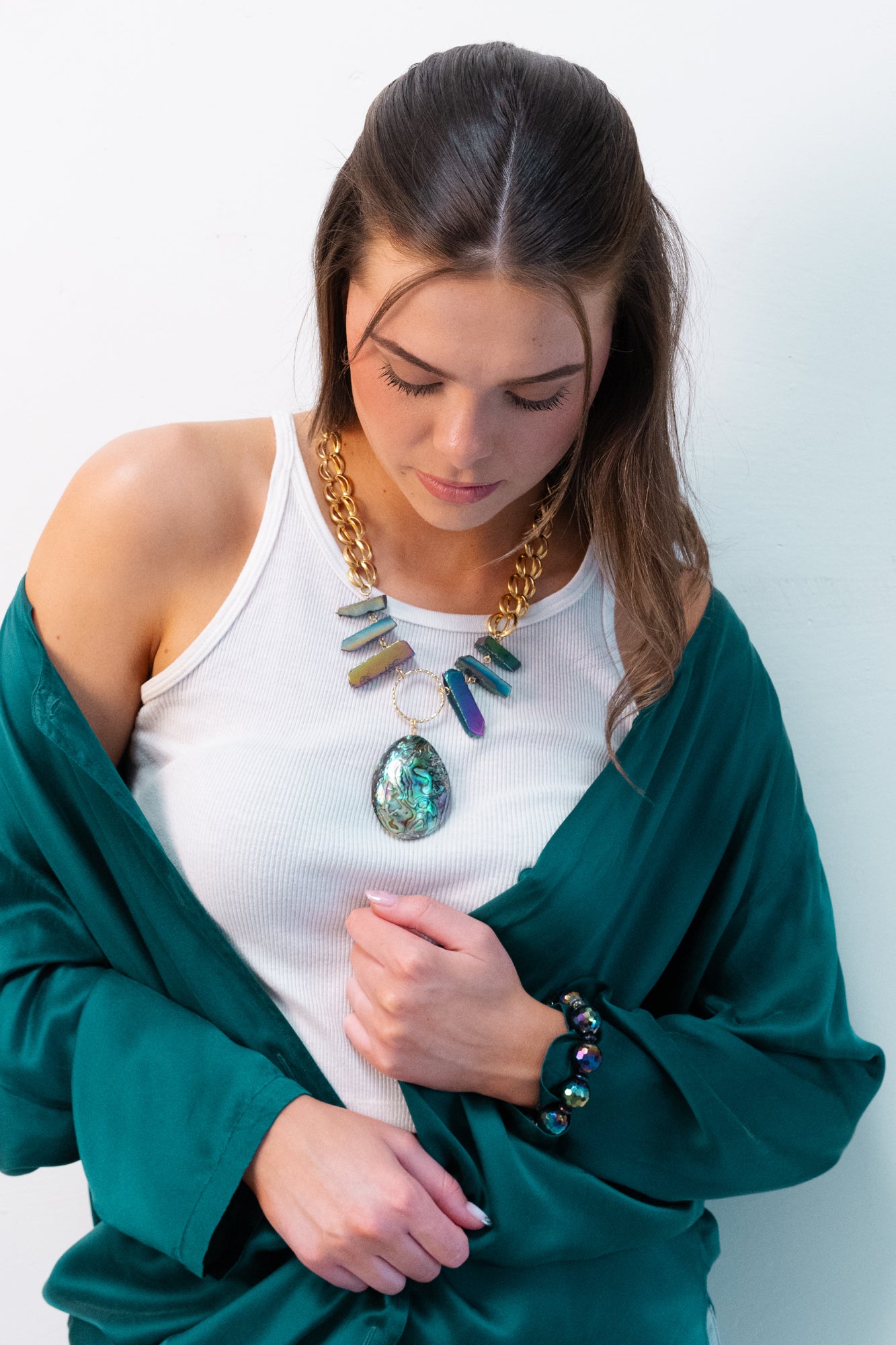 Paua shell necklace and dark iridescent kimoyo bracelet by Jenny Dayco 1