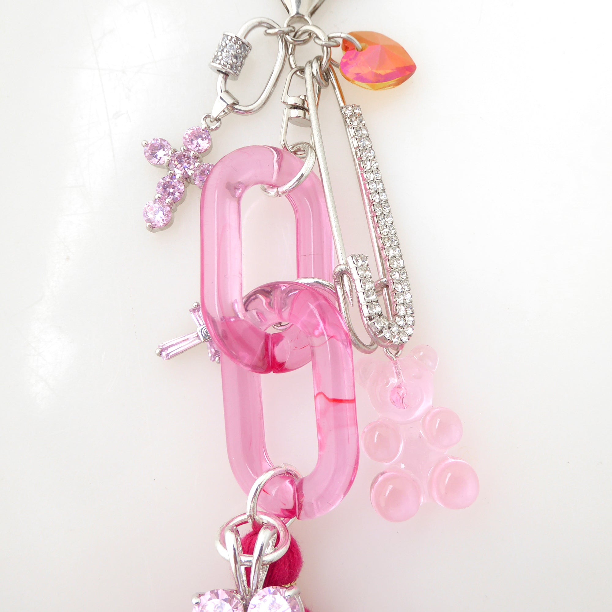 Pink cubic zirconia cross purse charm by Jenny Dayco 4