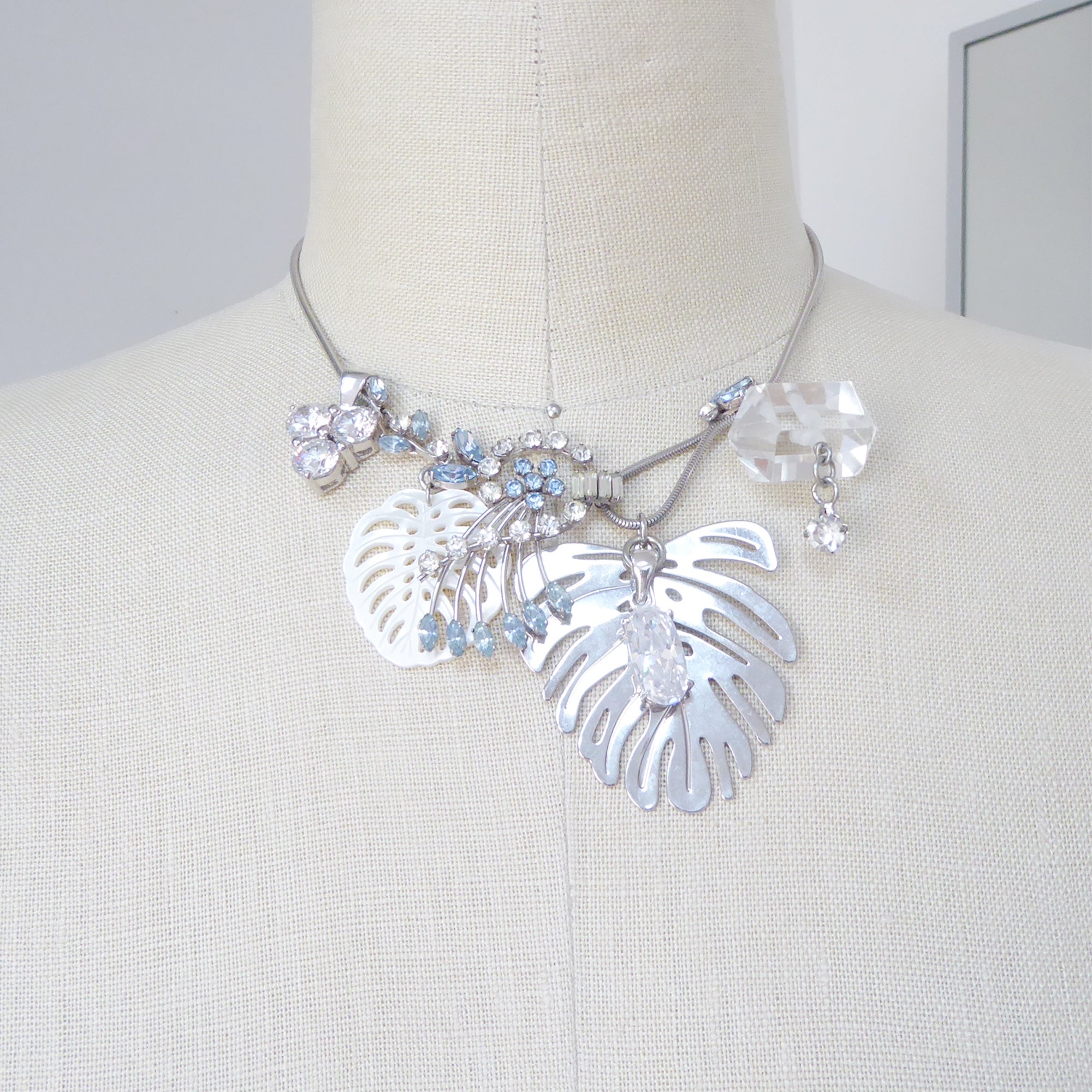 Silver monstera leaf cluster necklace by Jenny Dayco 8