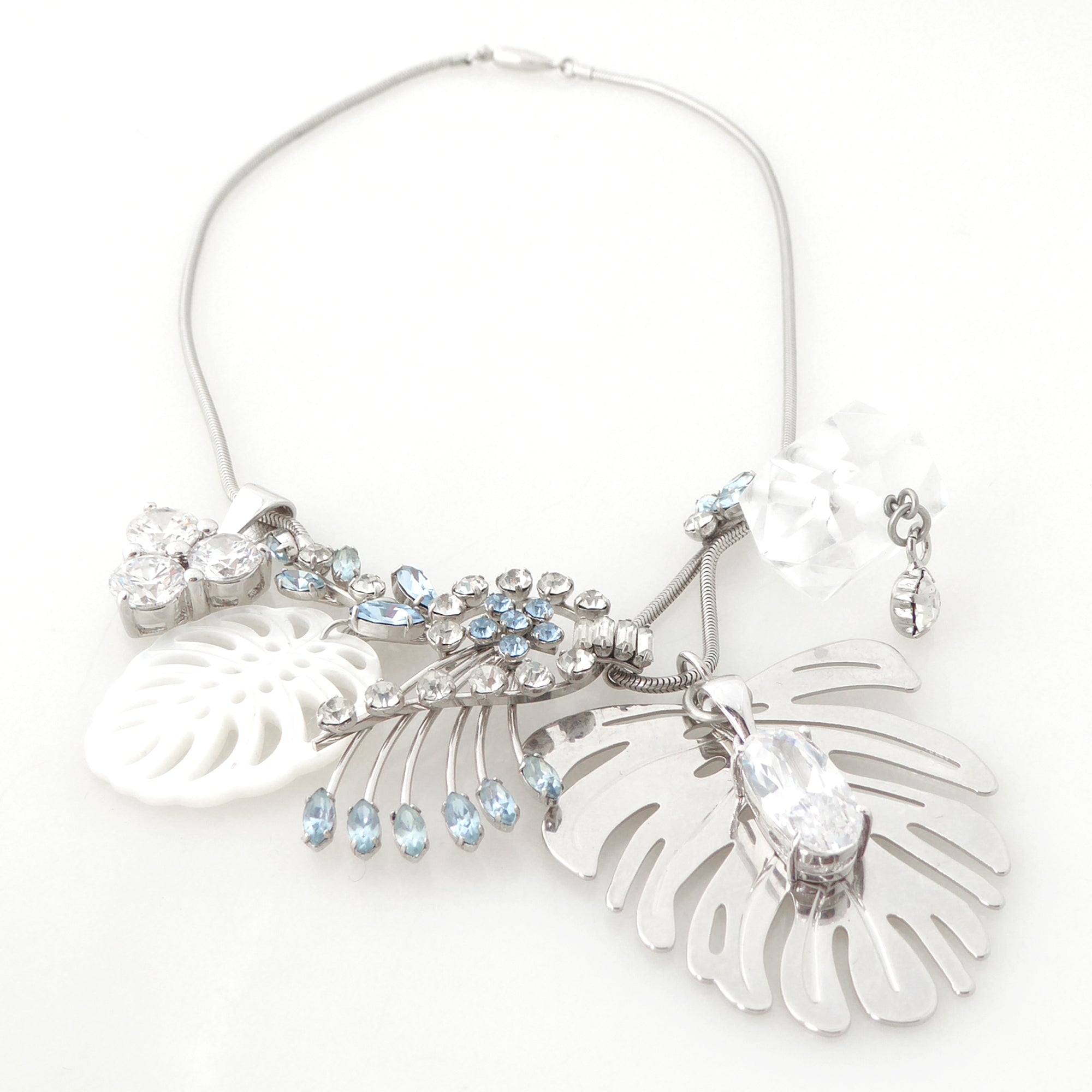 Silver monstera leaf cluster necklace by Jenny Dayco 3