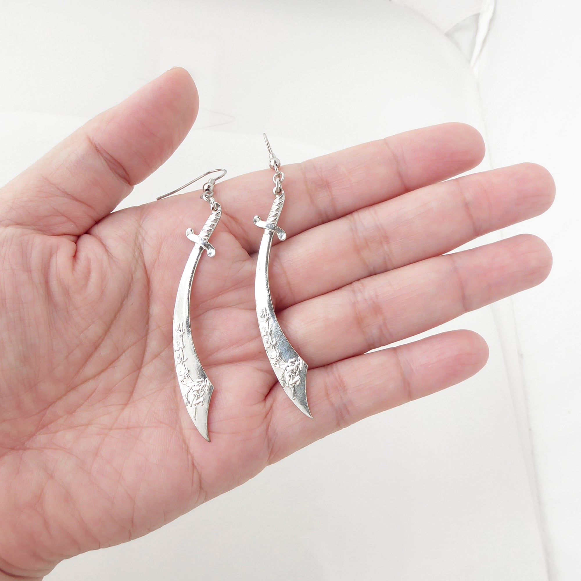 Silver sword earrings by Jenny Dayco 4