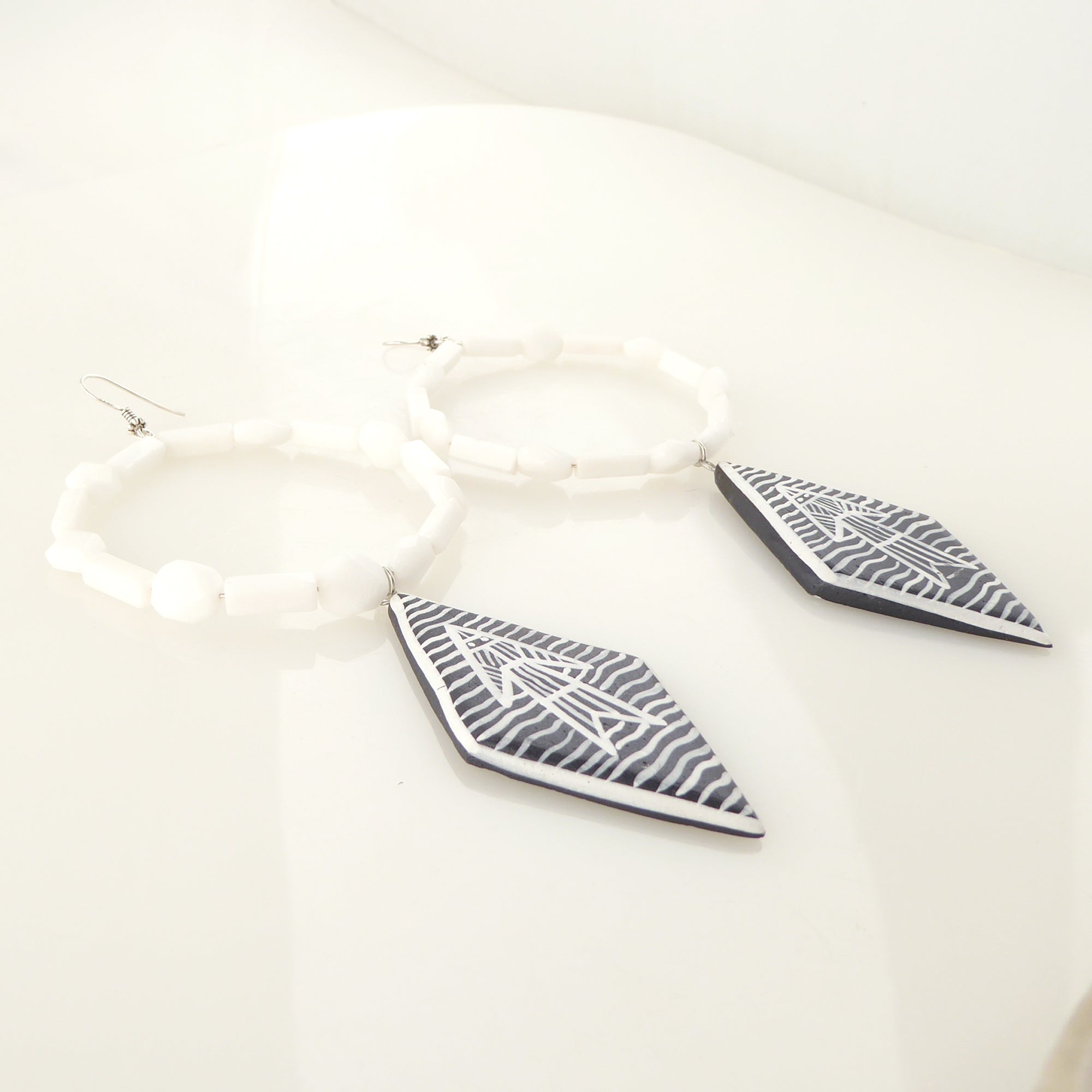 White jade abstract fish earrings by Jenny Dayco 2