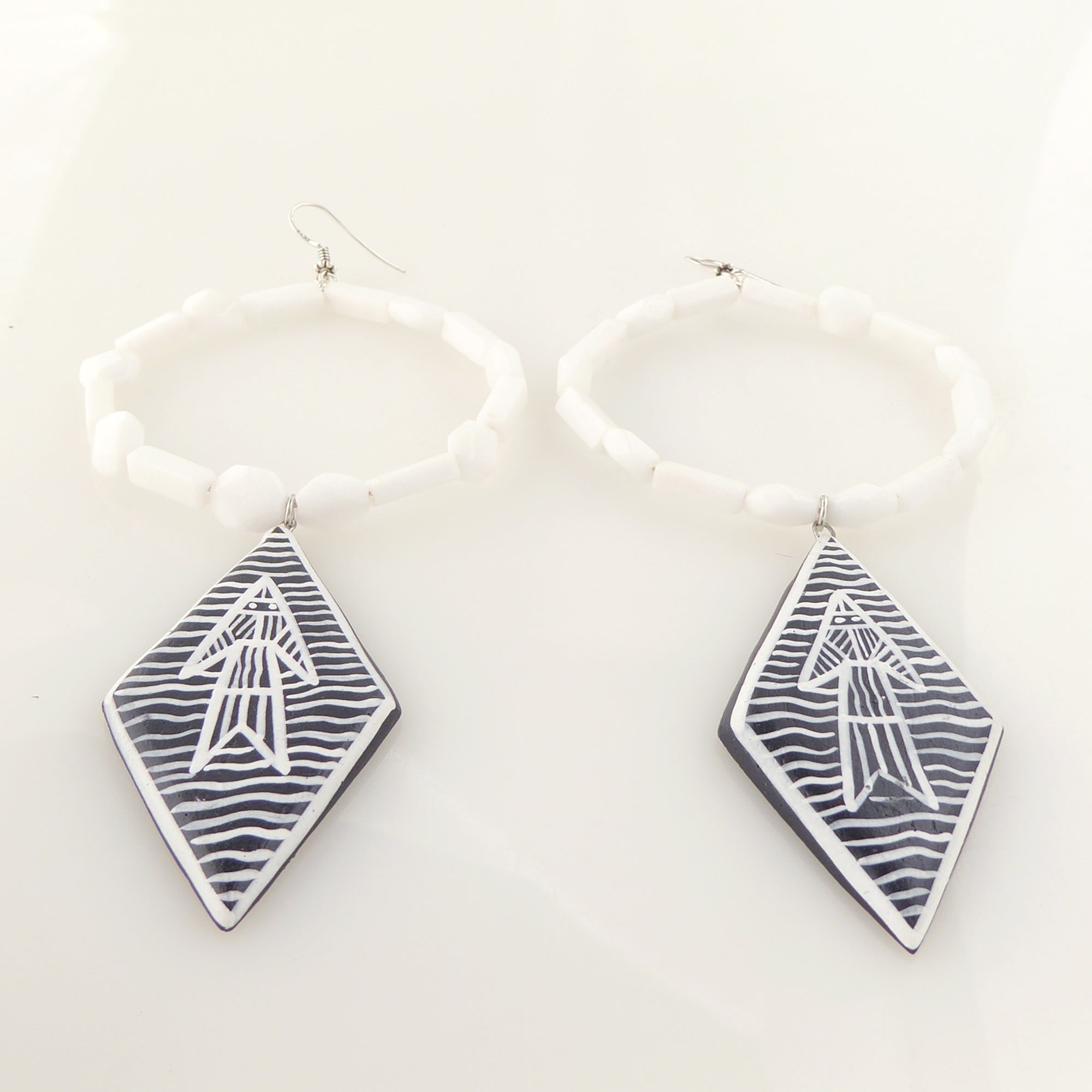 White jade abstract fish earrings by Jenny Dayco 3