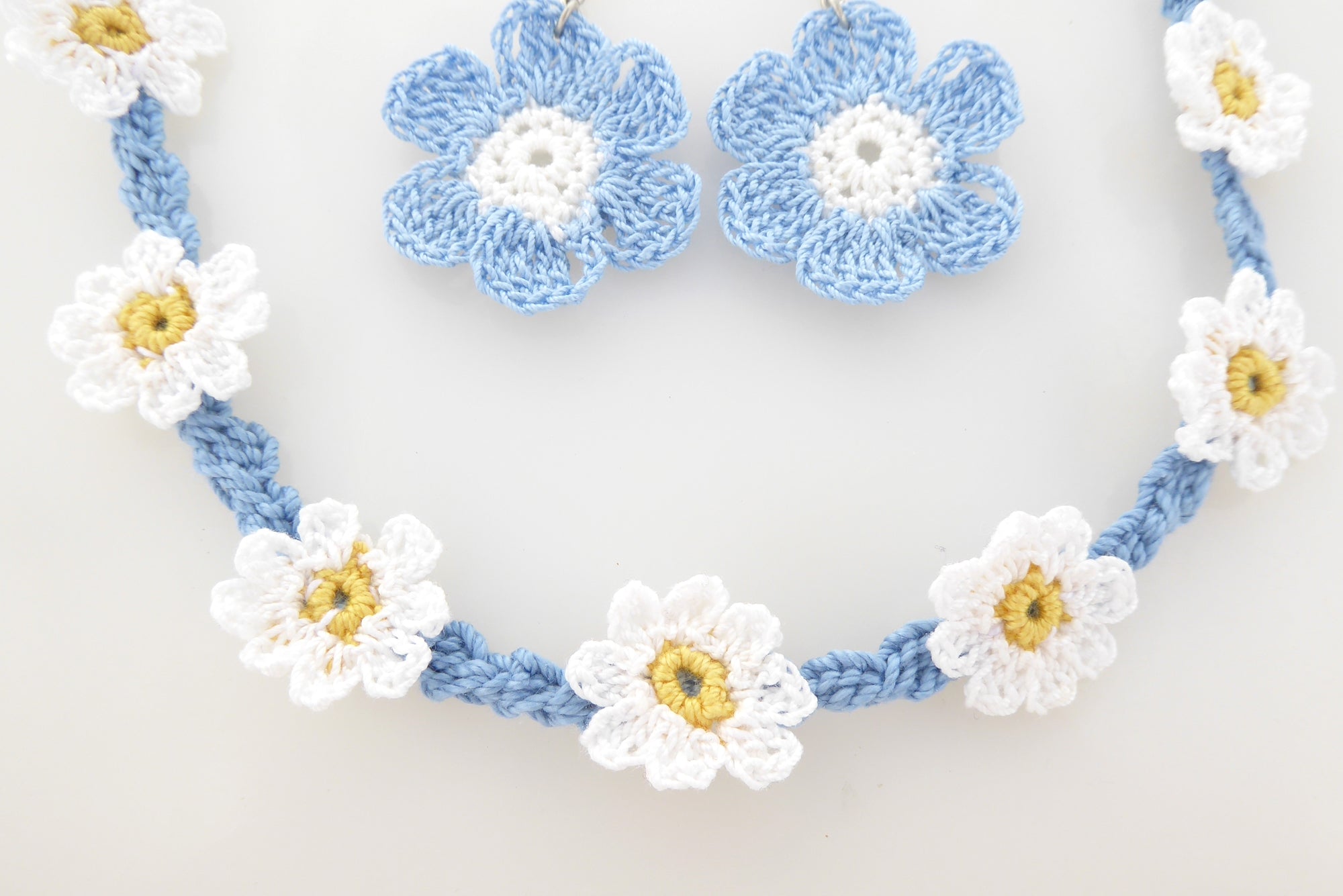 Blue and white flower crochet earring and necklace set by Jenny Dayco 5
