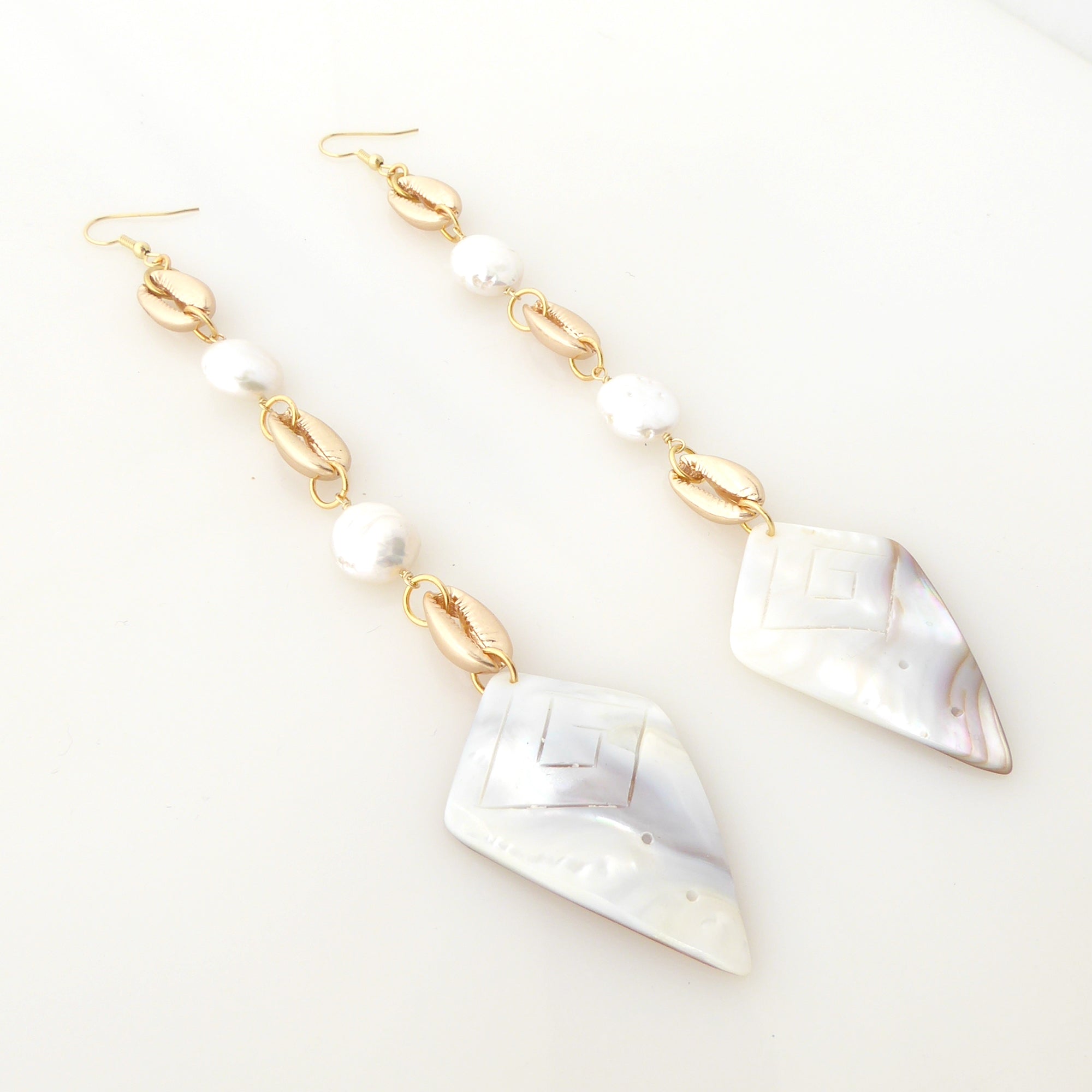 Cowrie shell and pearl earrings by Jenny Dayco 2