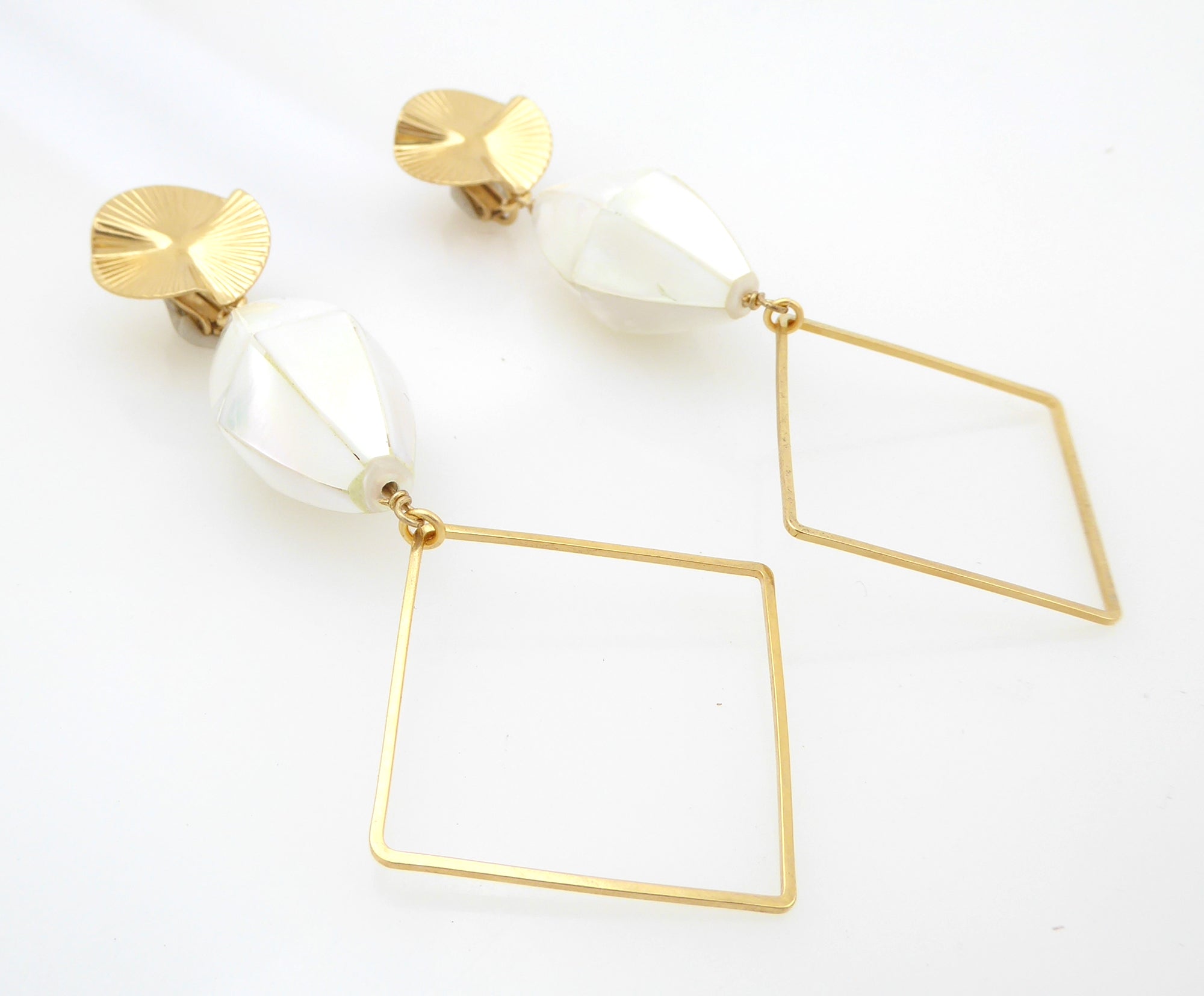 Gold diamond and shell earrings by Jenny Dayco 2