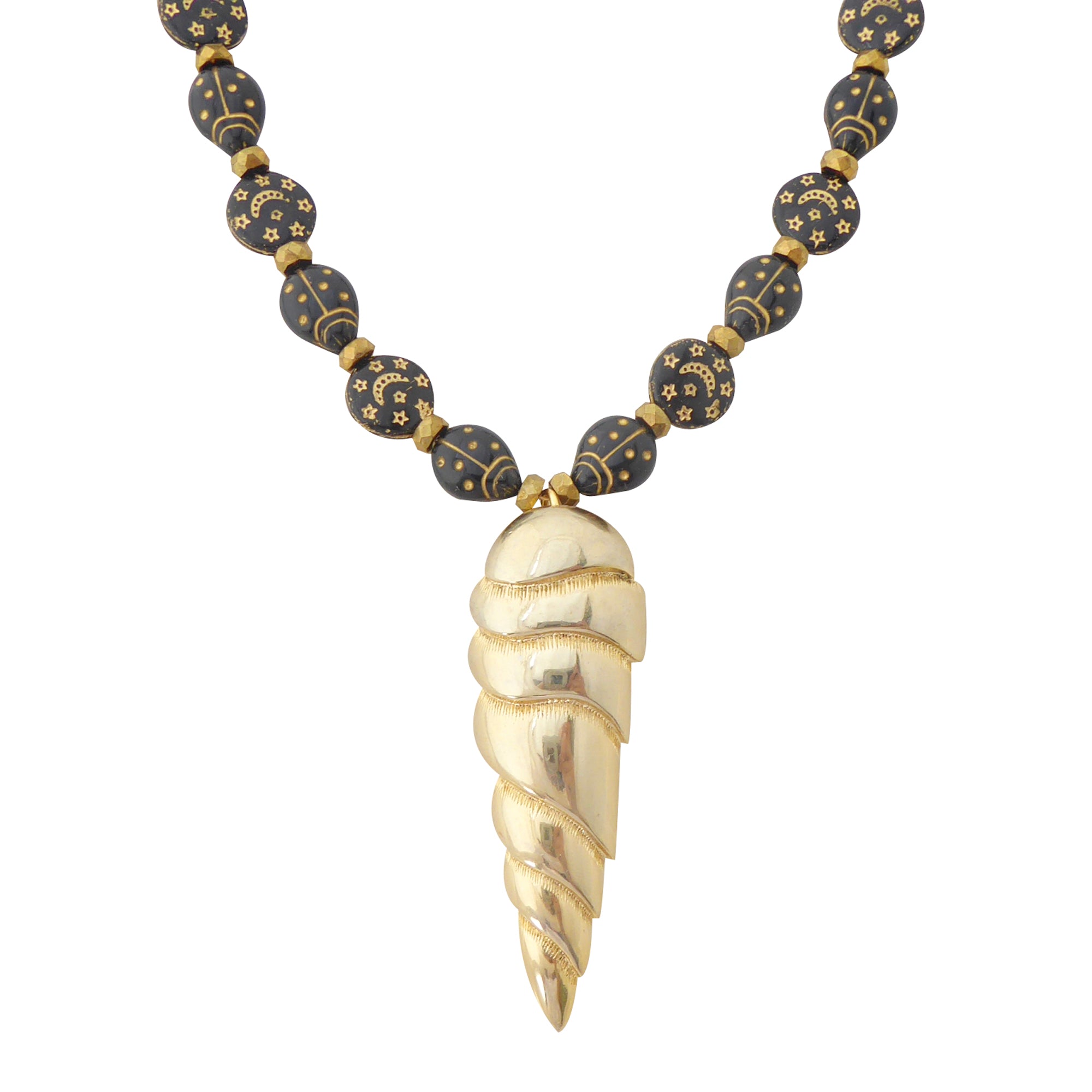 Golden spearhead necklace by Jenny Dayco 1